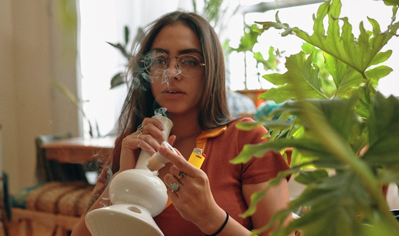 Girl smoke Bong with sunday goods weed inside