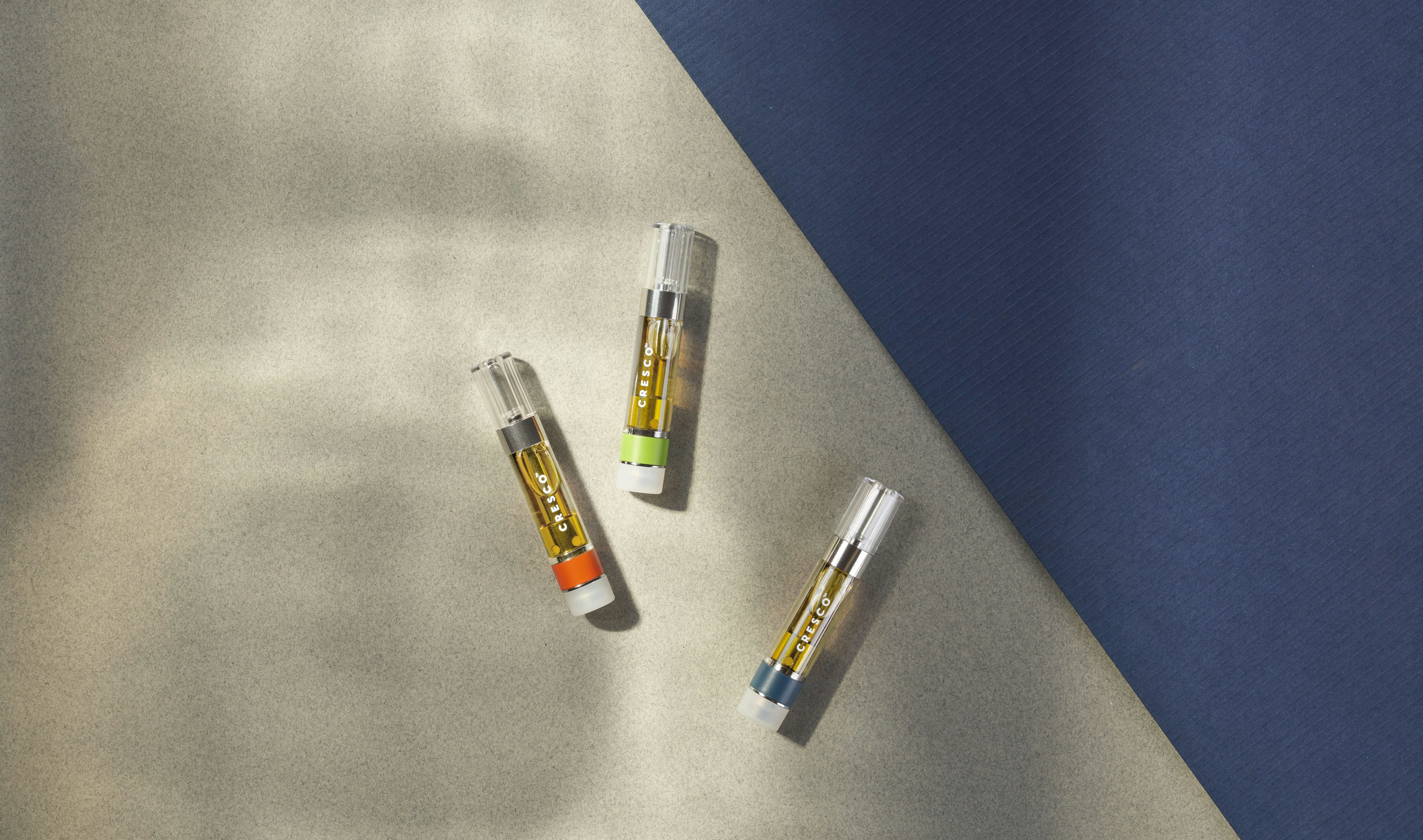 Multiple vape cartridges arranged side by side