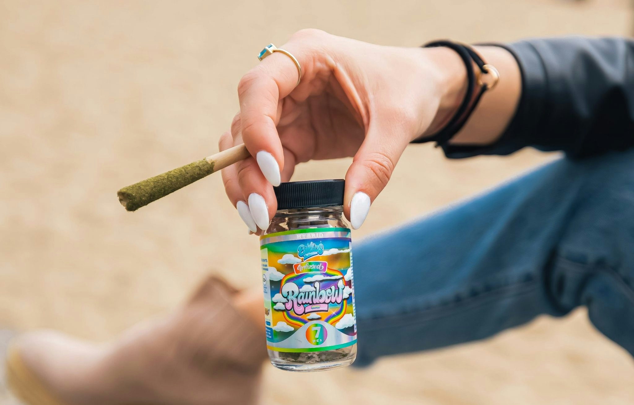 hand holding a pre-roll