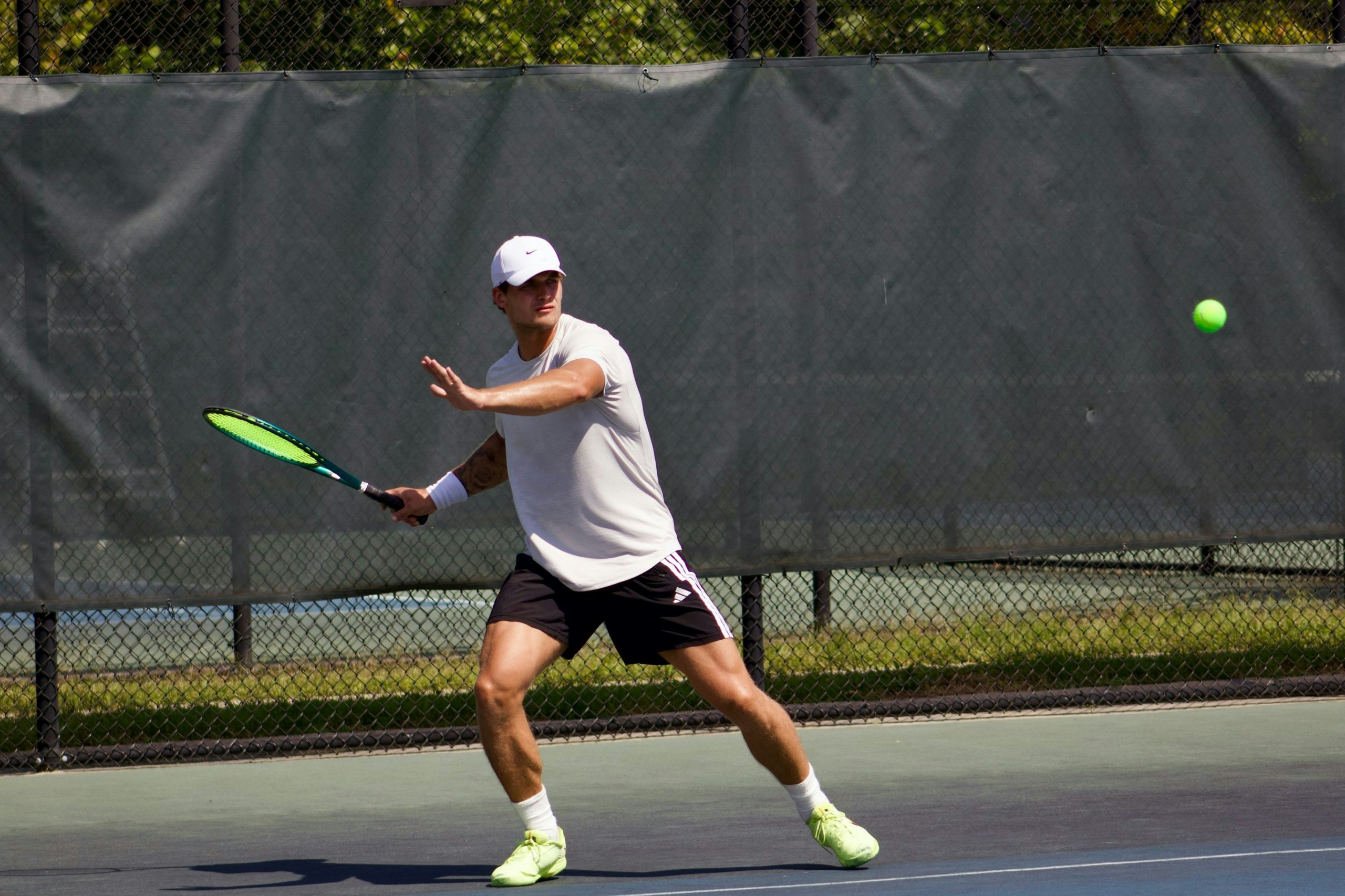Man playing tennis on a court