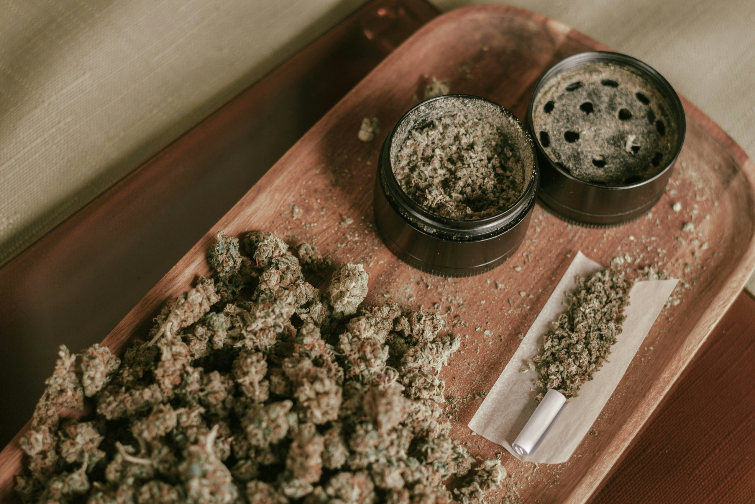 black and white round container on brown wooden table
