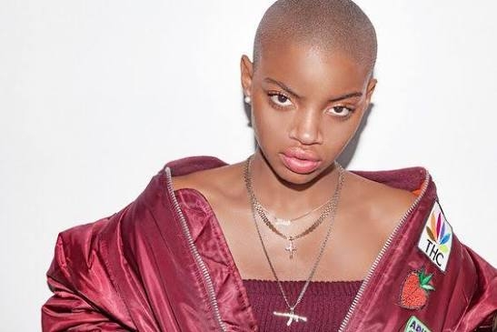 Slick Woods posing during a lifestyle photo shoot