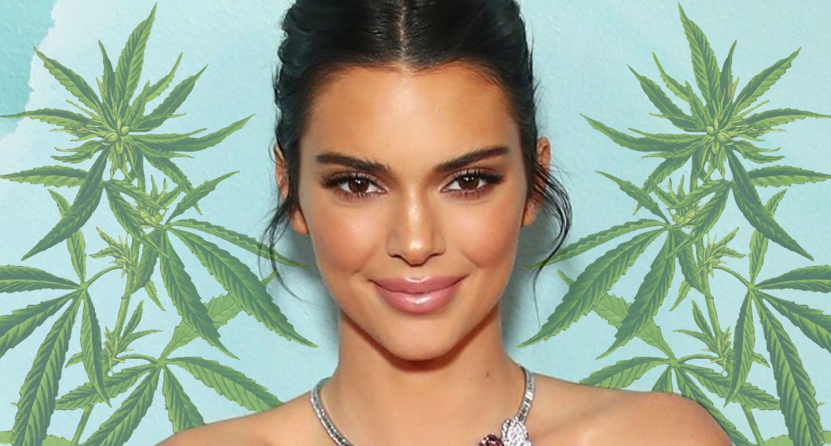 Kendall Jenner posing IN FRONT OF A WEED BACKGROUND