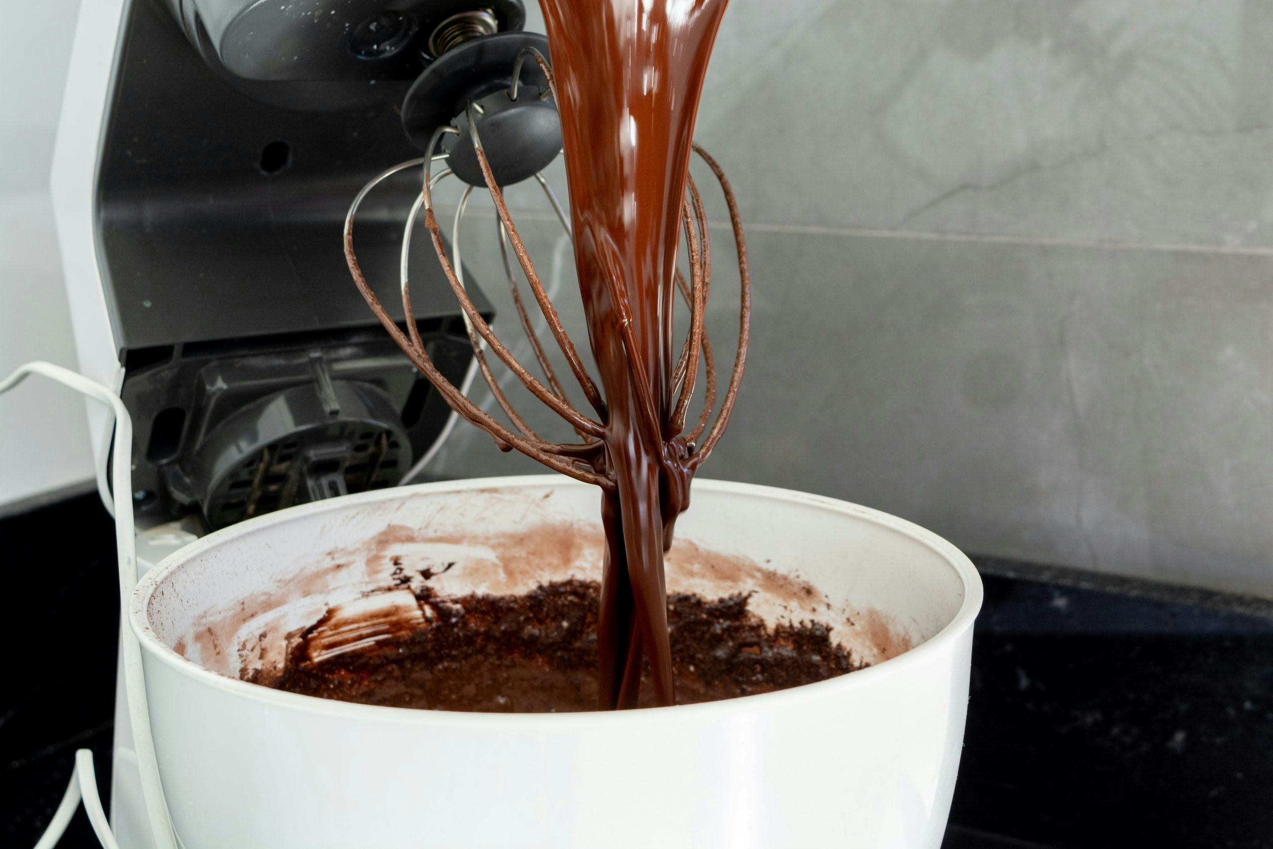 Cannabis brownie batter being mixed in a large kitchen bowll