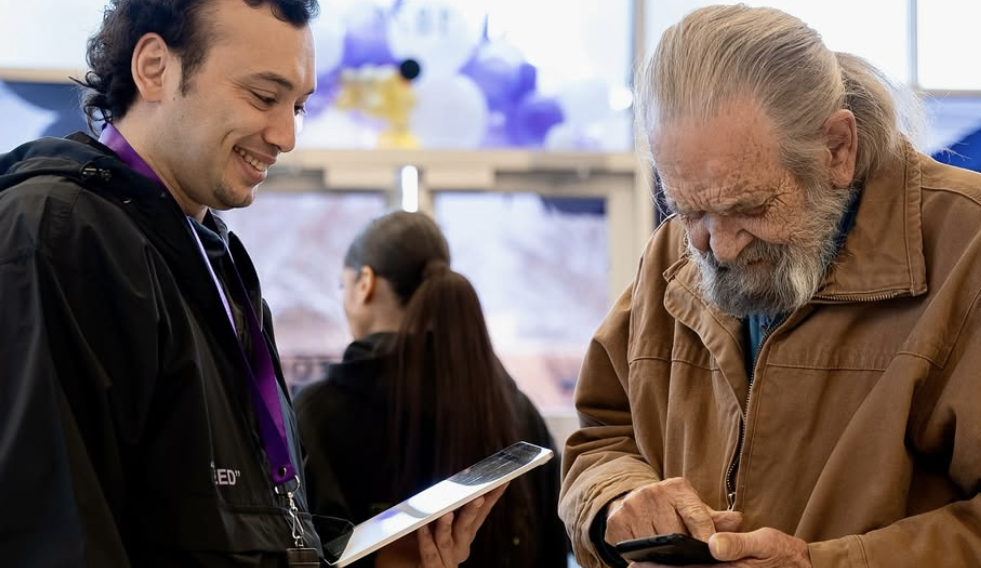 budtender helping a man in the strain stars dispensary