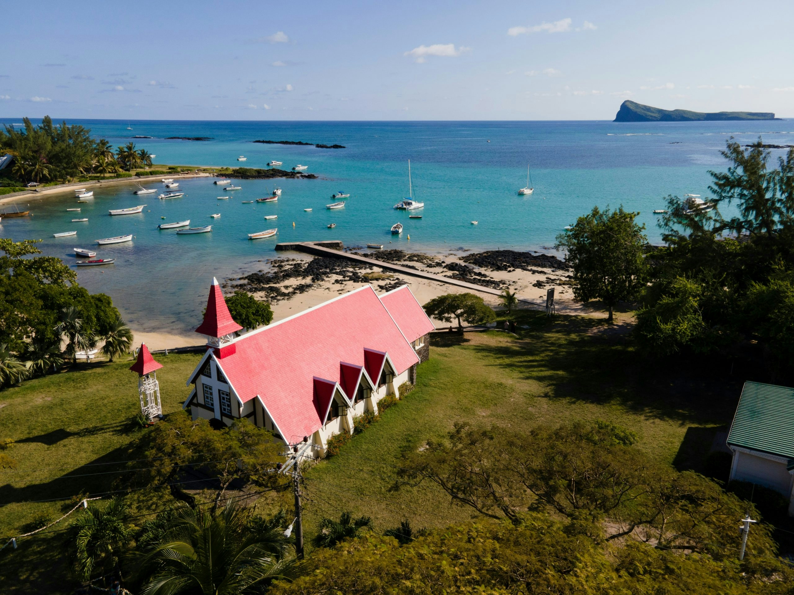Tropical coastline in Mauritius featuring calm lagoons and lush vegetation