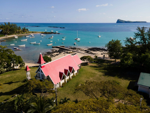 Tropical coastline in Mauritius featuring calm lagoons and lush vegetation