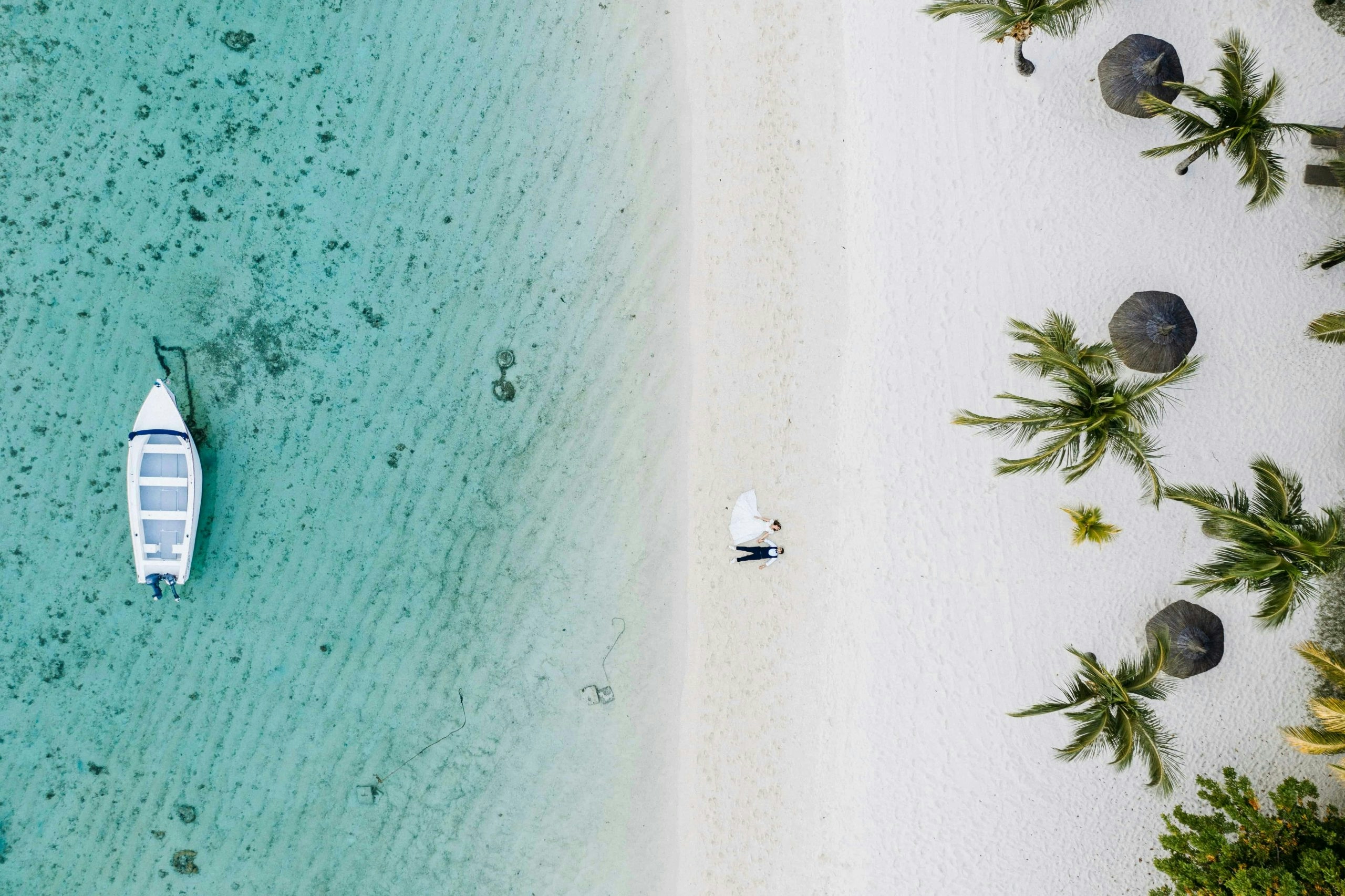 Pristine shoreline in Mauritius with turquoise water and blue skies