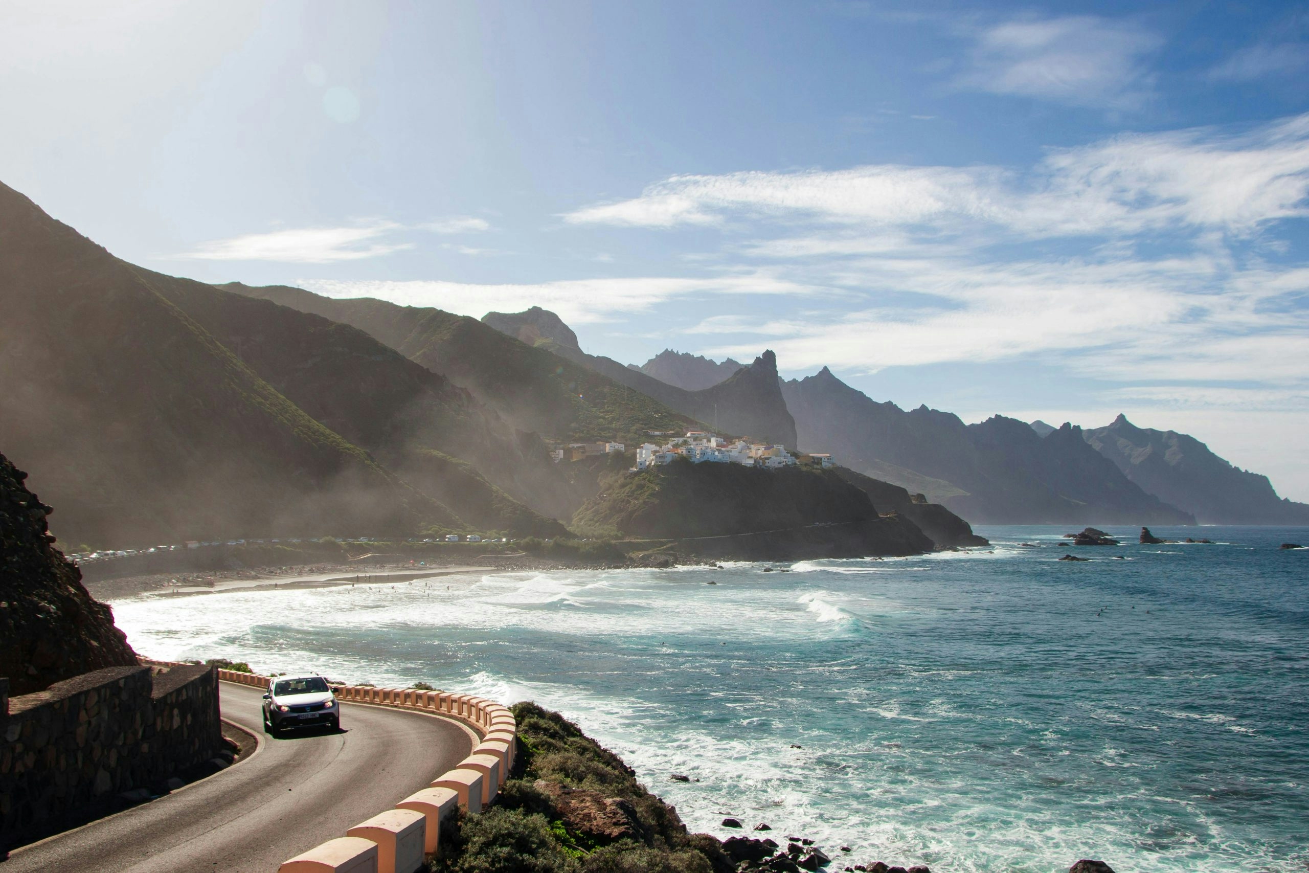 Dramatic coastline in Tenerife with volcanic cliffs and turquoise water