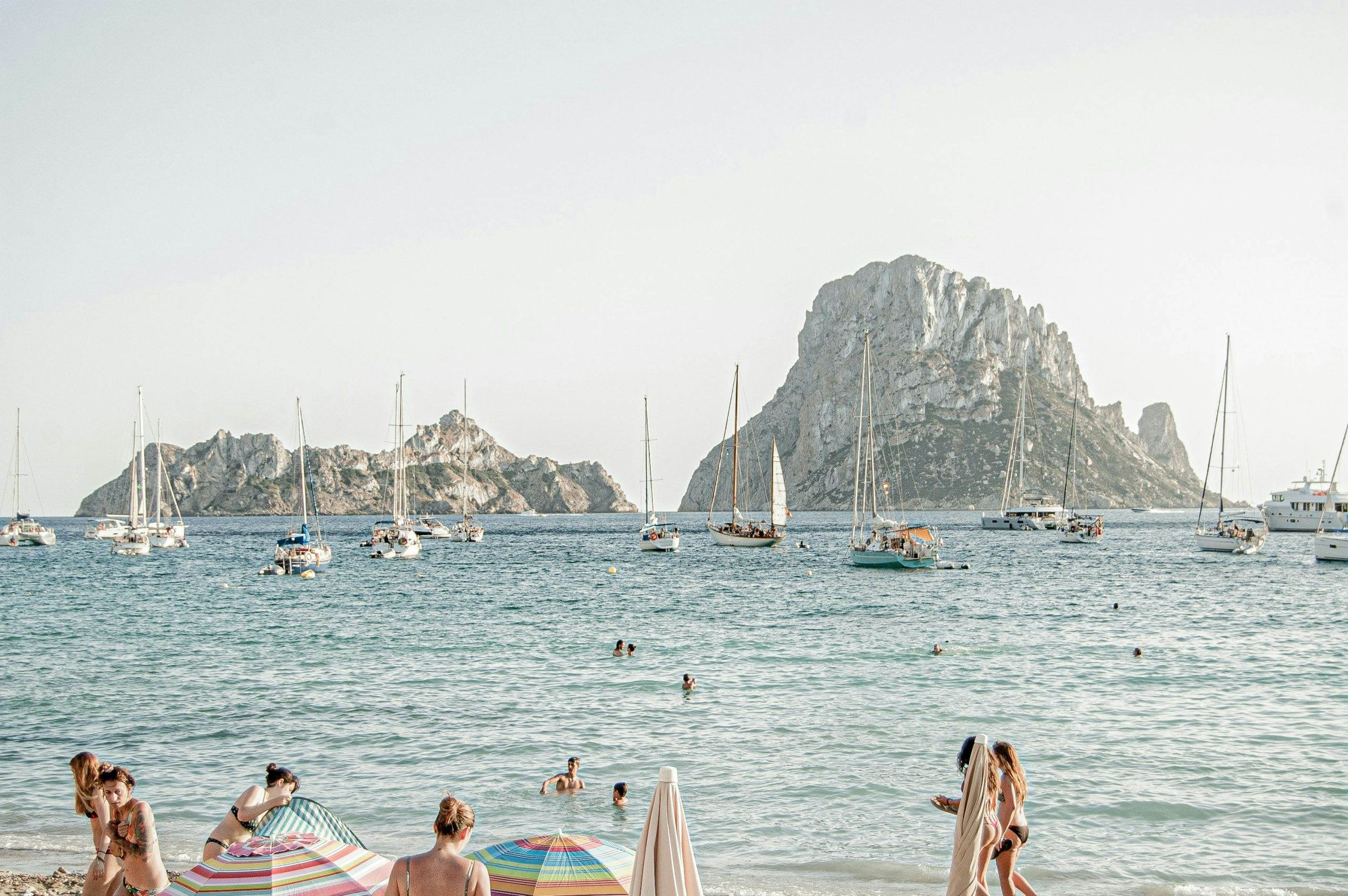 Rocky shoreline overlooking the blue waters surrounding Ibiza