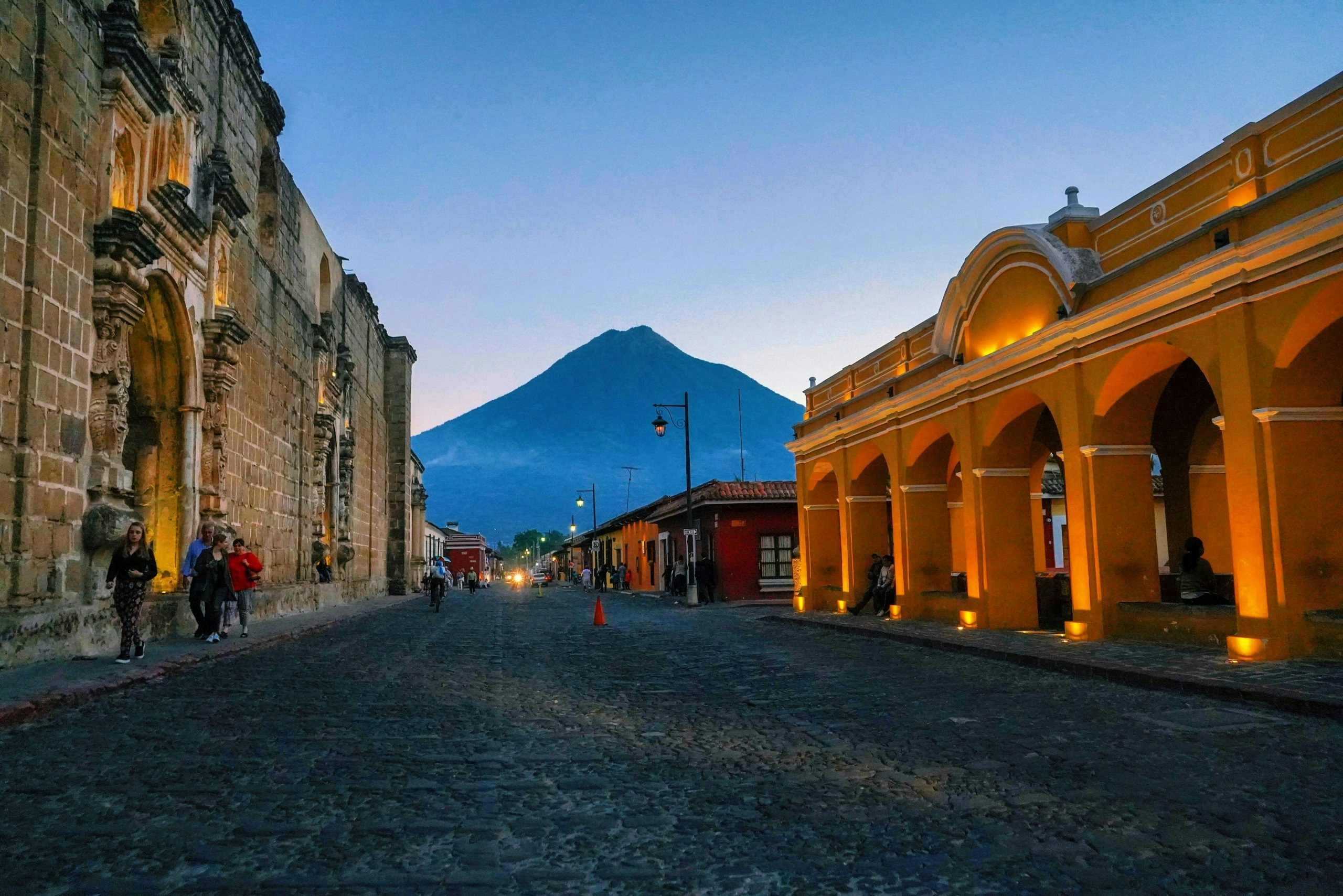 Panoramic view of Guatemala City with modern buildings and surrounding mountains