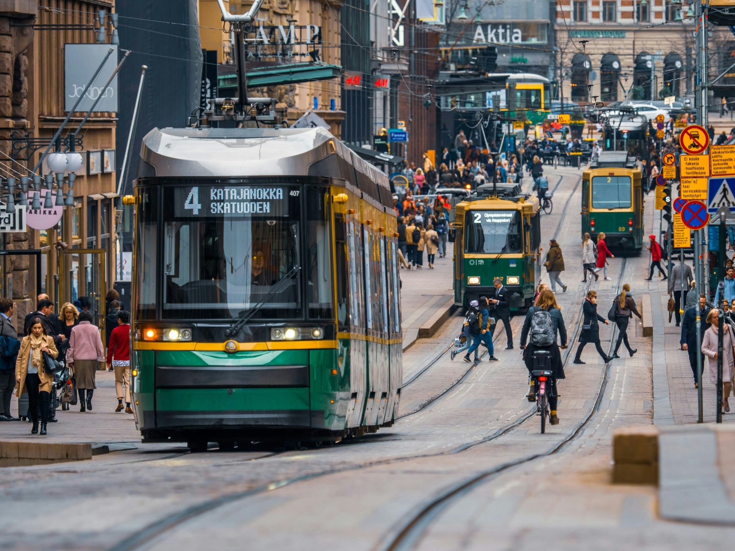 Busy city street in Helsinki showcasing everyday urban life