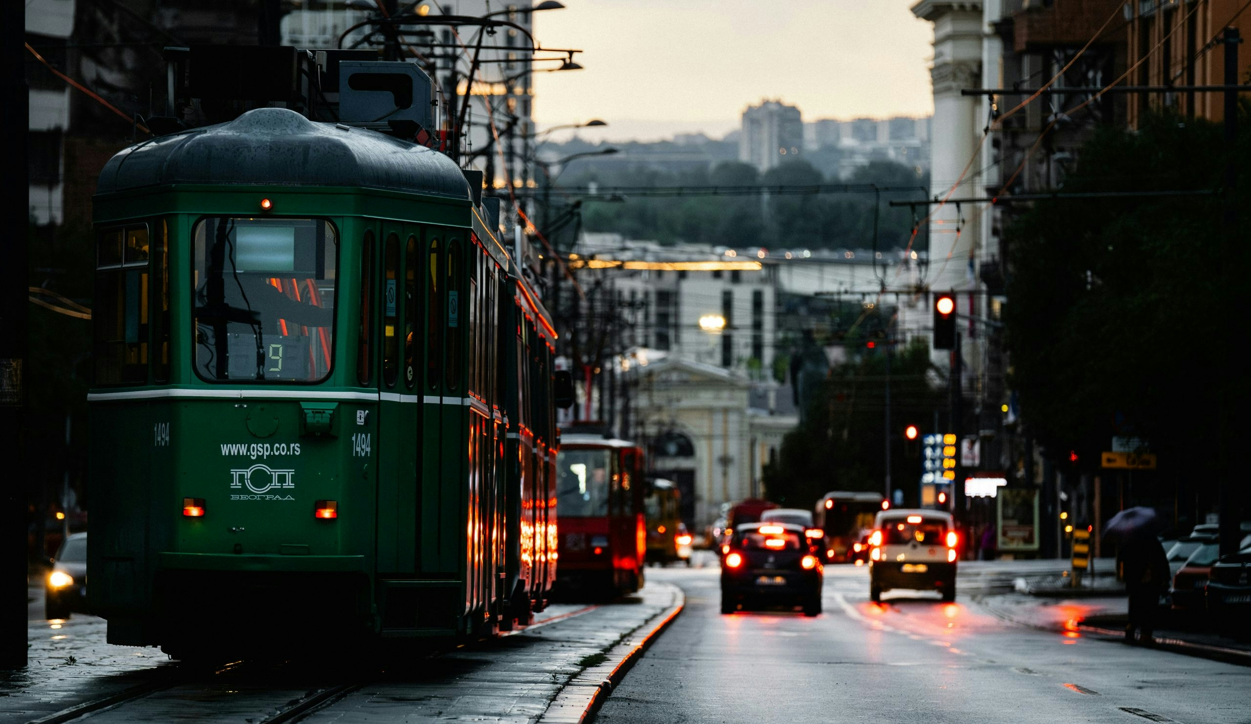 Busy city center in Serbia with pedestrians and local businesses