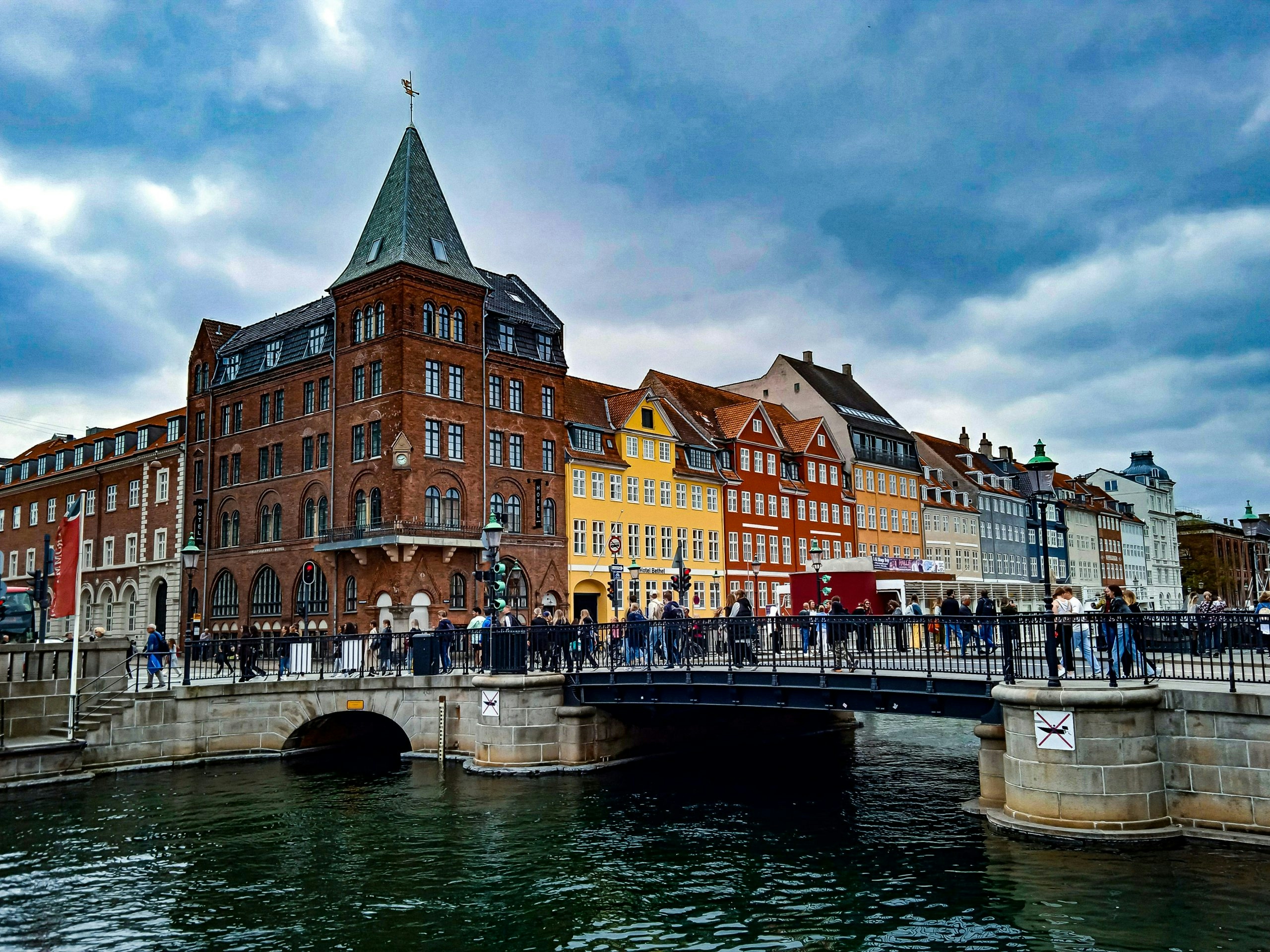 Popular tourist area in Denmark with pedestrians and local shops