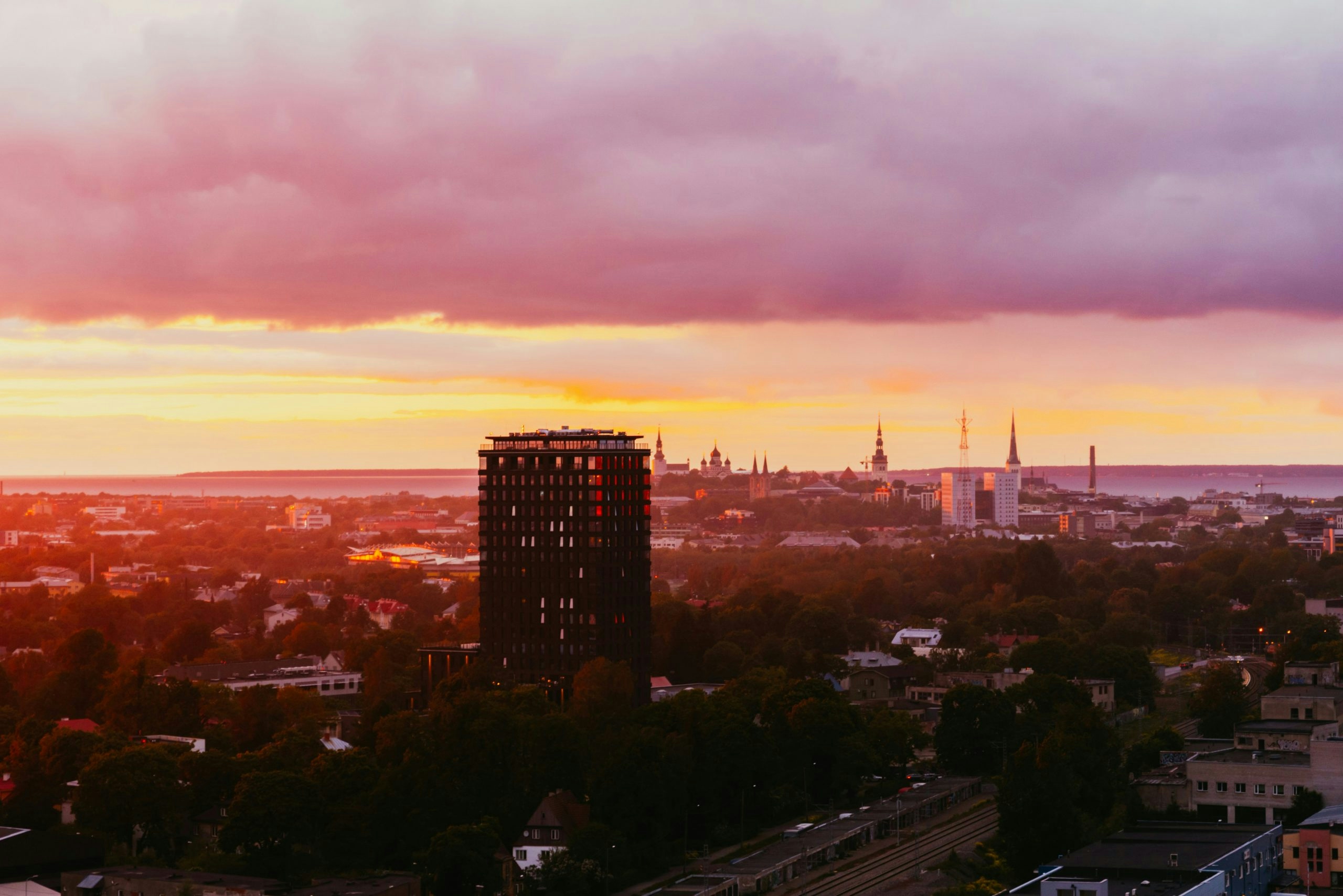 Panoramic view of Tallinn, Estonia, featuring medieval architecture and church spires
