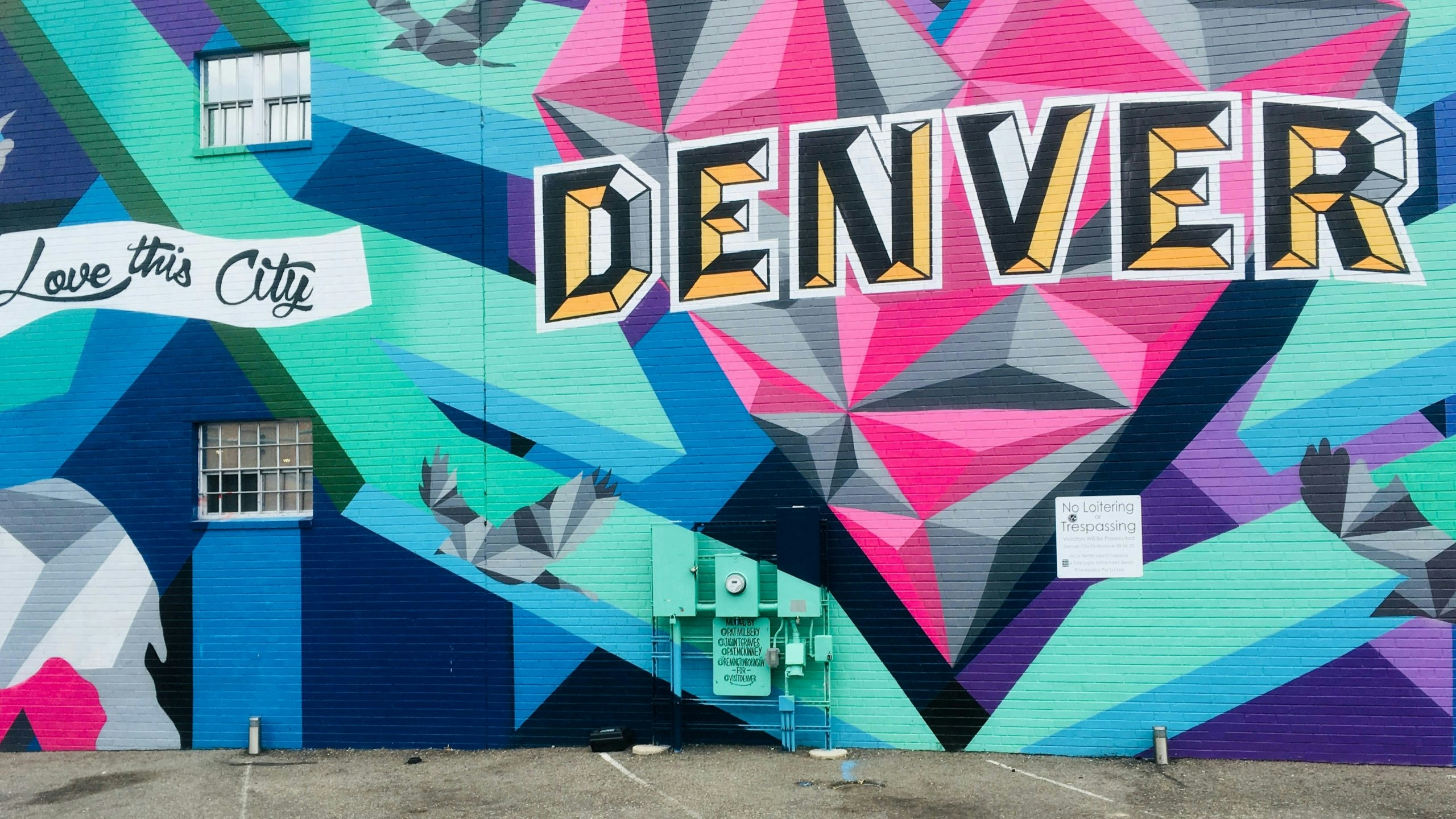Colorful 'Denver' mural showcasing the city's vibrant street art scene