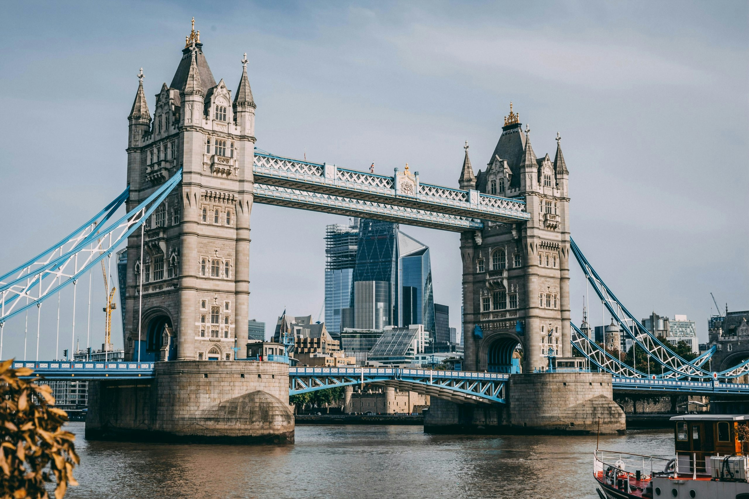 Panoramic view of the London skyline featuring the River Thames and iconic landmarks