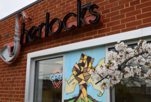 Outside view of Sherlocks Glass dispensary, known for offering the best exotic THCA flower in a welcoming retail environment