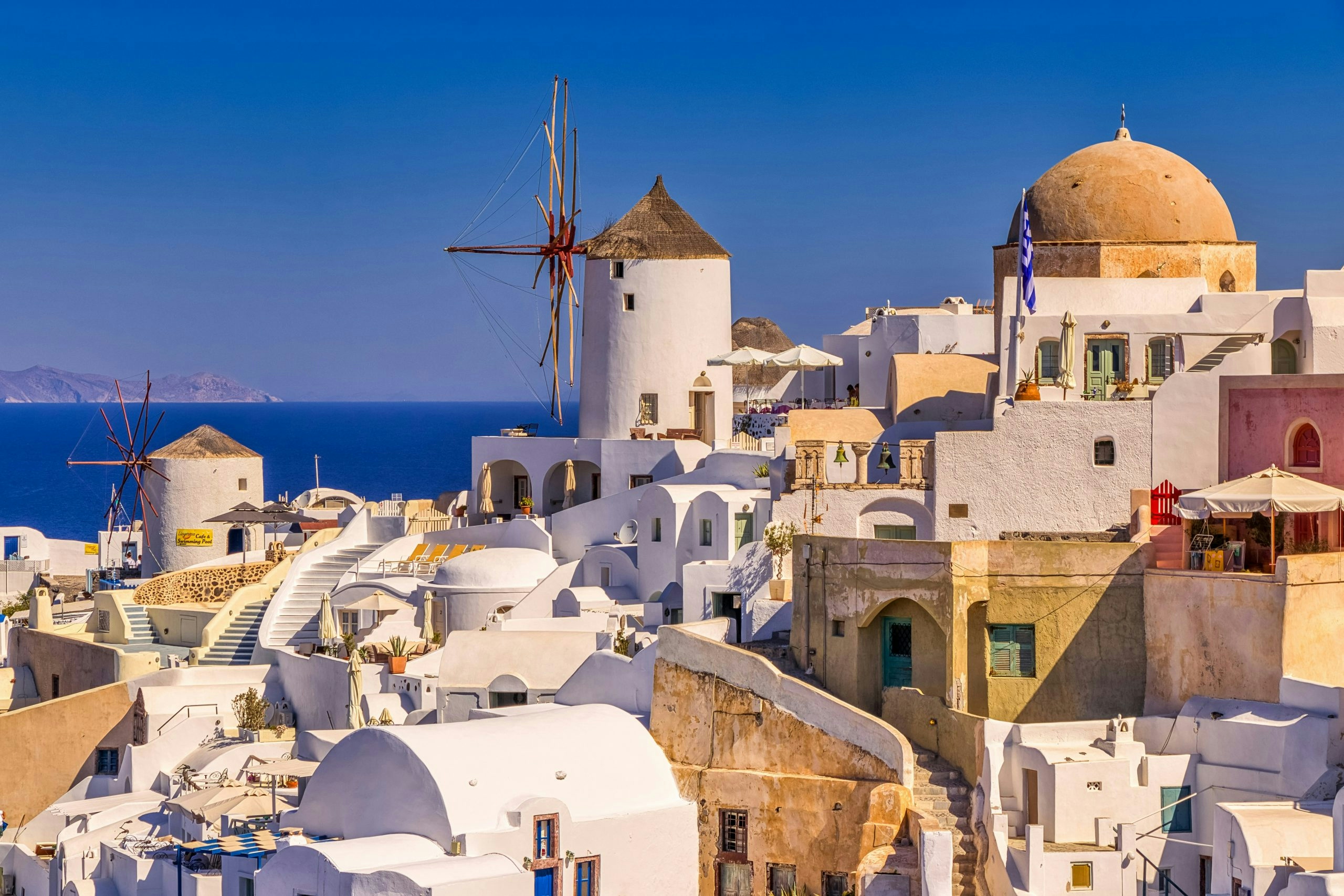 Historic architecture and scenic coastal views in Santorini's famous cliffside villages