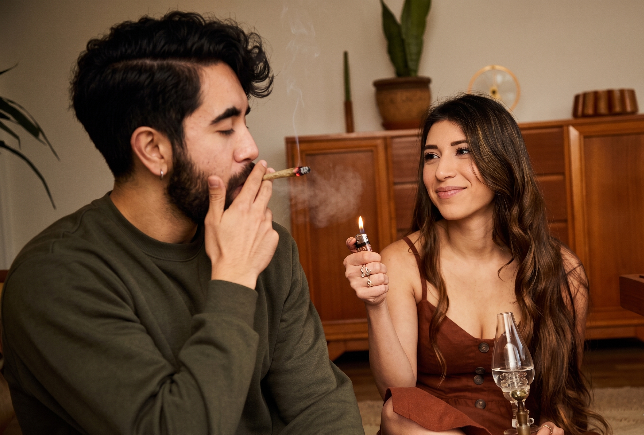 Adults relaxing while enjoying an Apples and Bananas cannabis joint