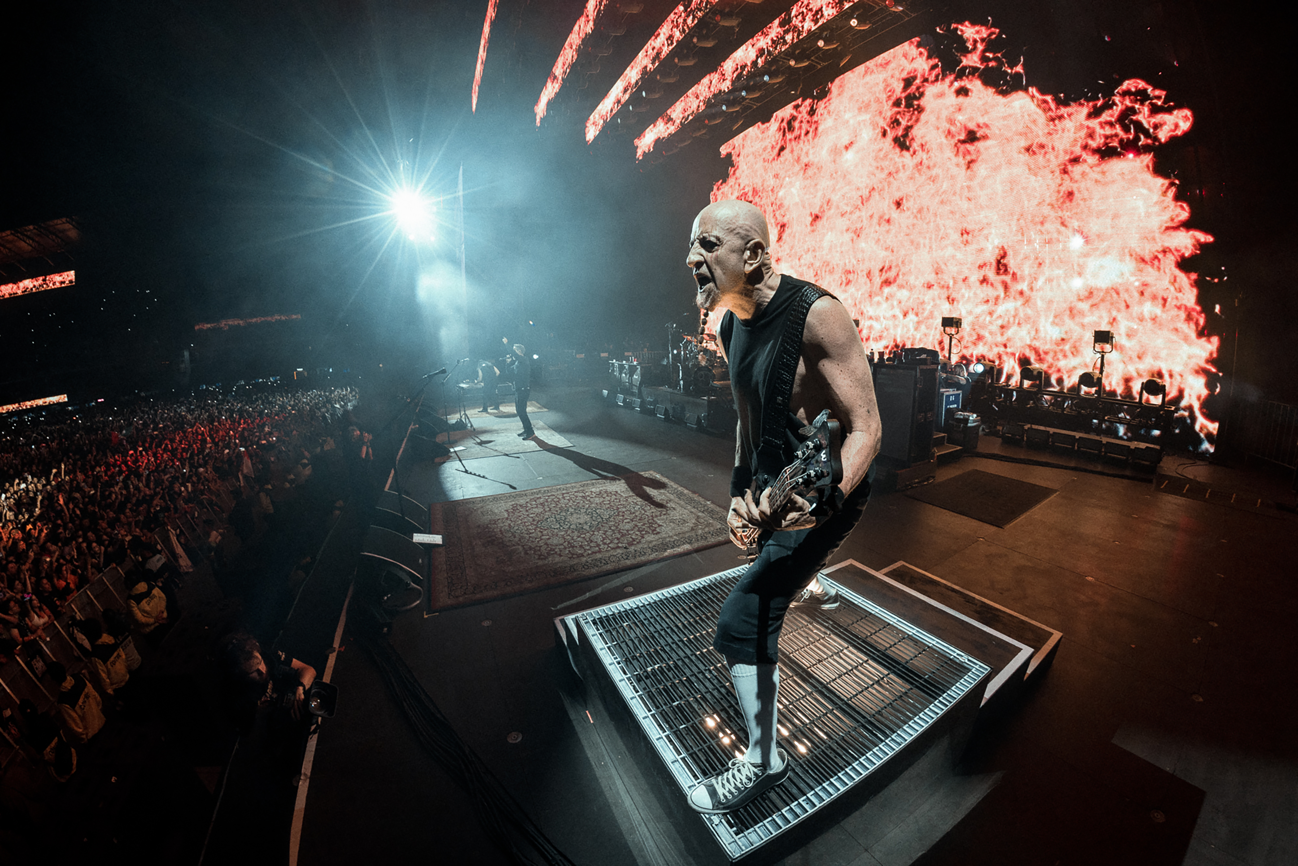 Shavo Odadjian performing live on stage during a concert