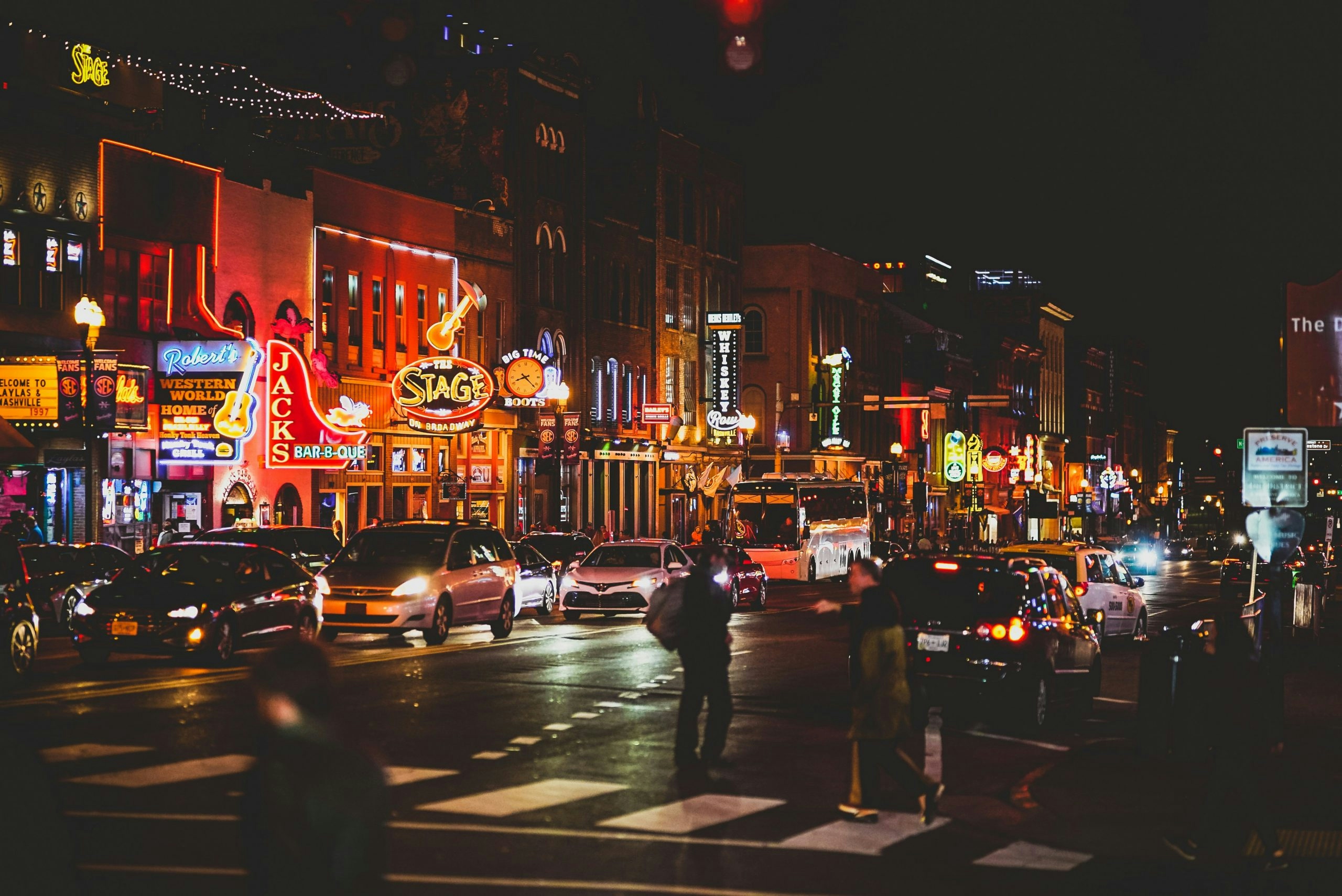 Neon signs illuminating Nashville's famous Broadway entertainment district