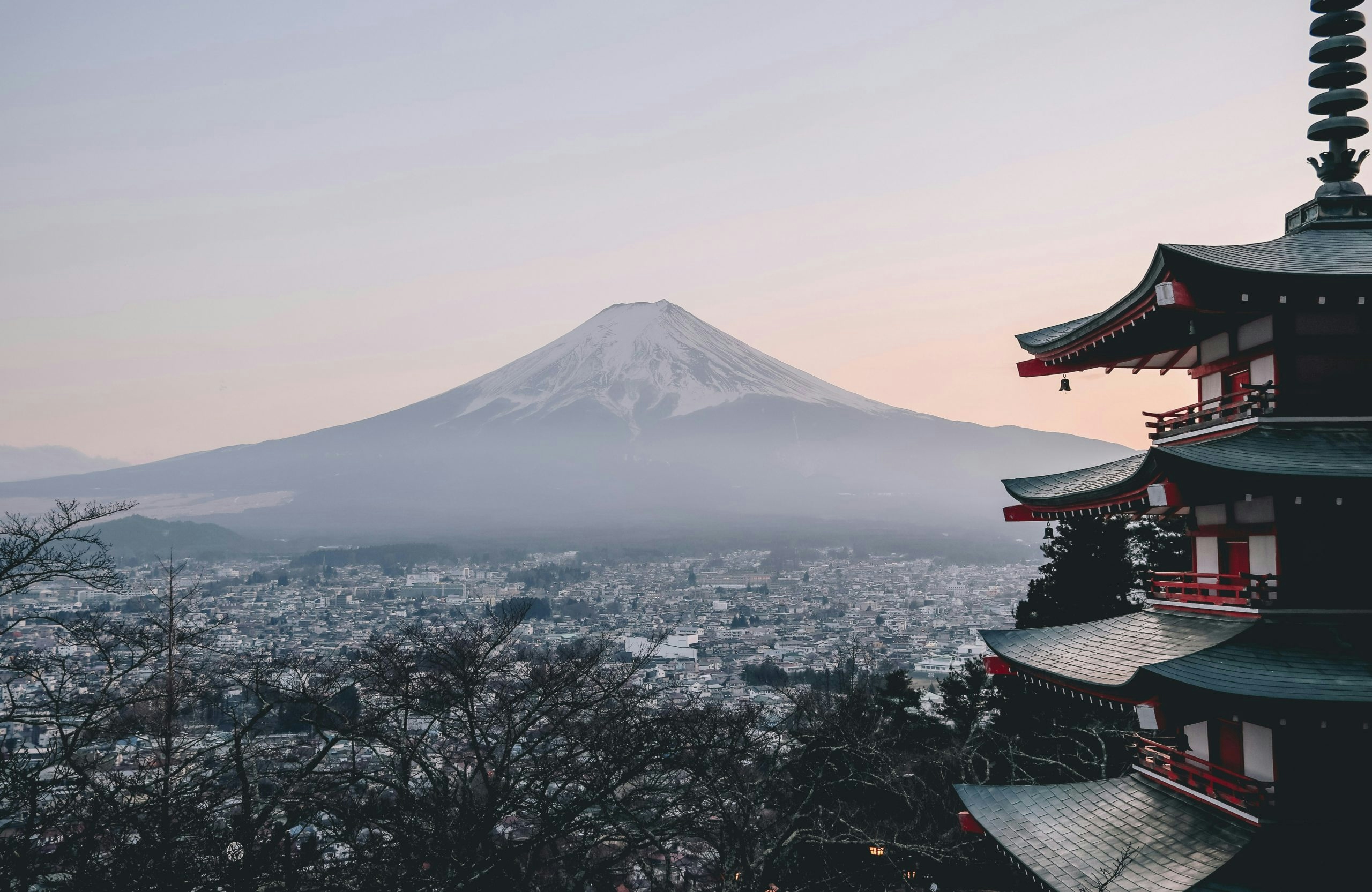 Mount Fuji rising above the surrounding landscape on a clear day
