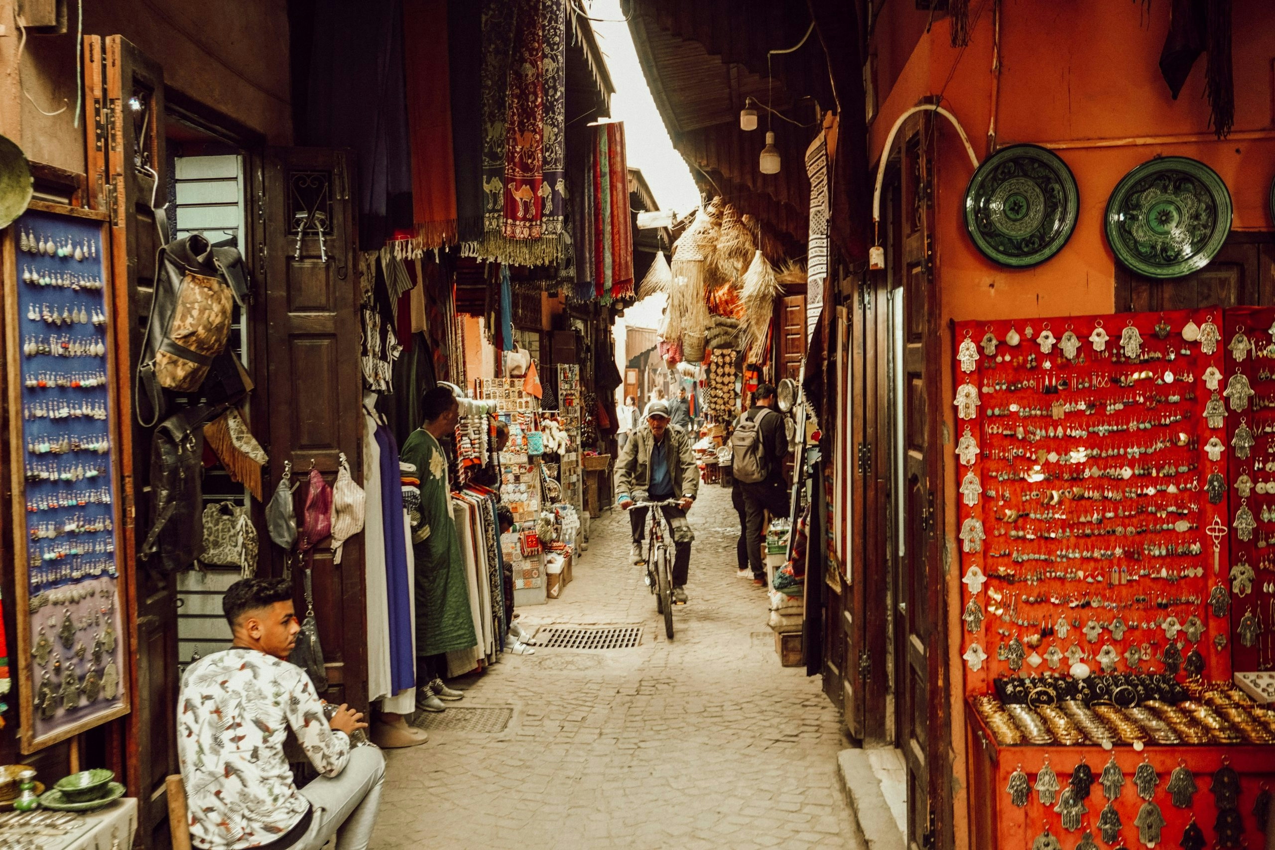 Colorful traditional street in Morocco lined with local shops