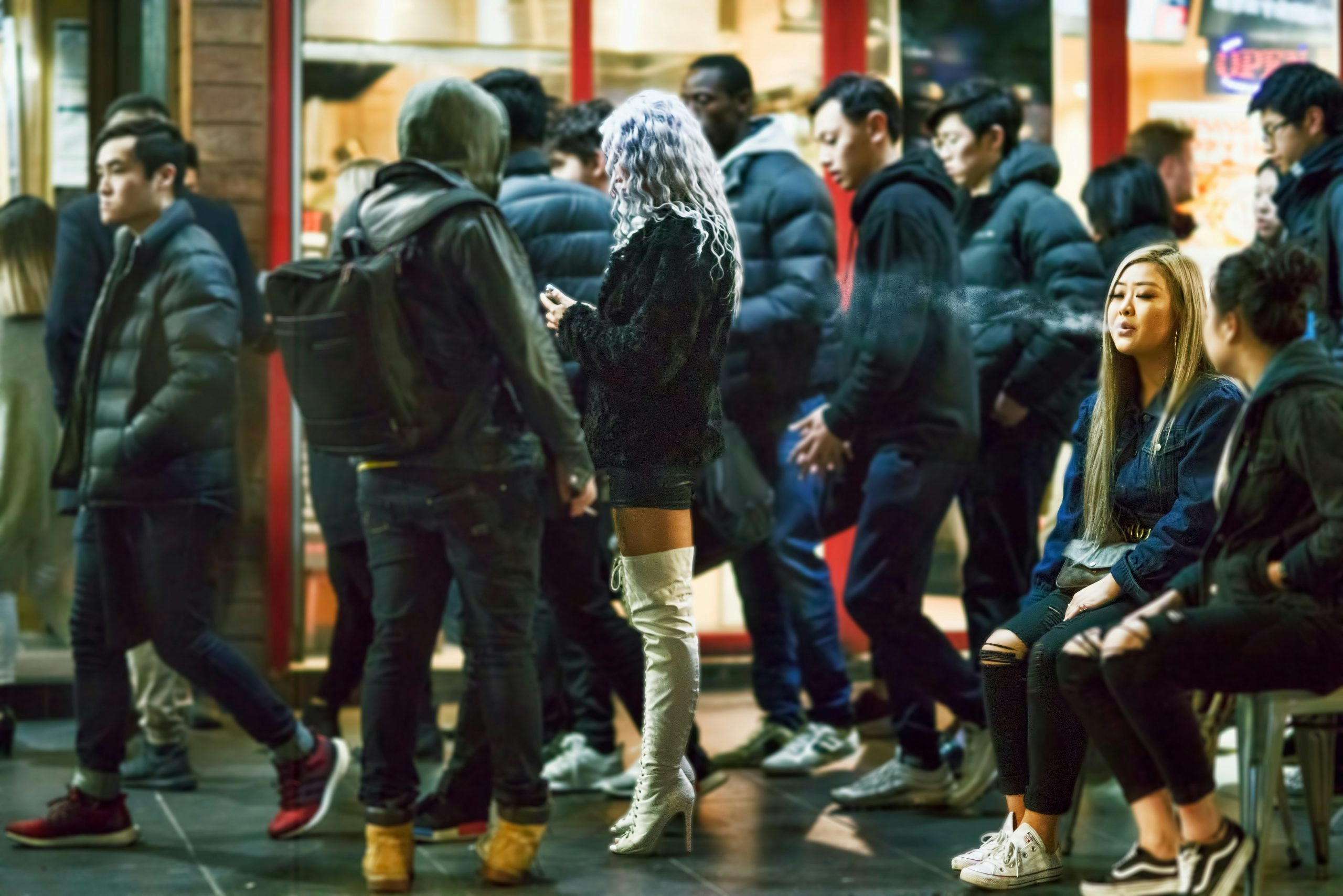 Group of people walking together on a street in Australia