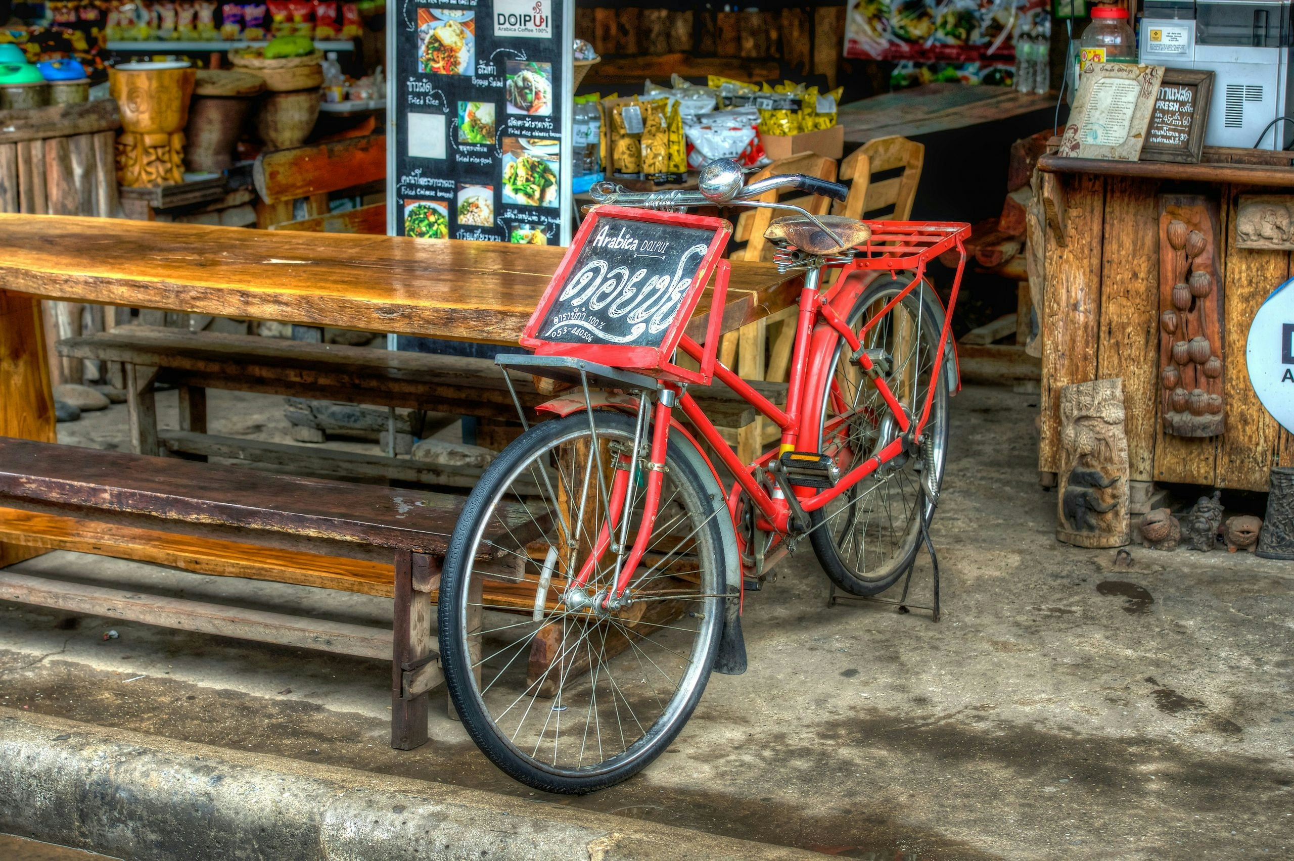 Narrow street lined with shops in Chiang Mai