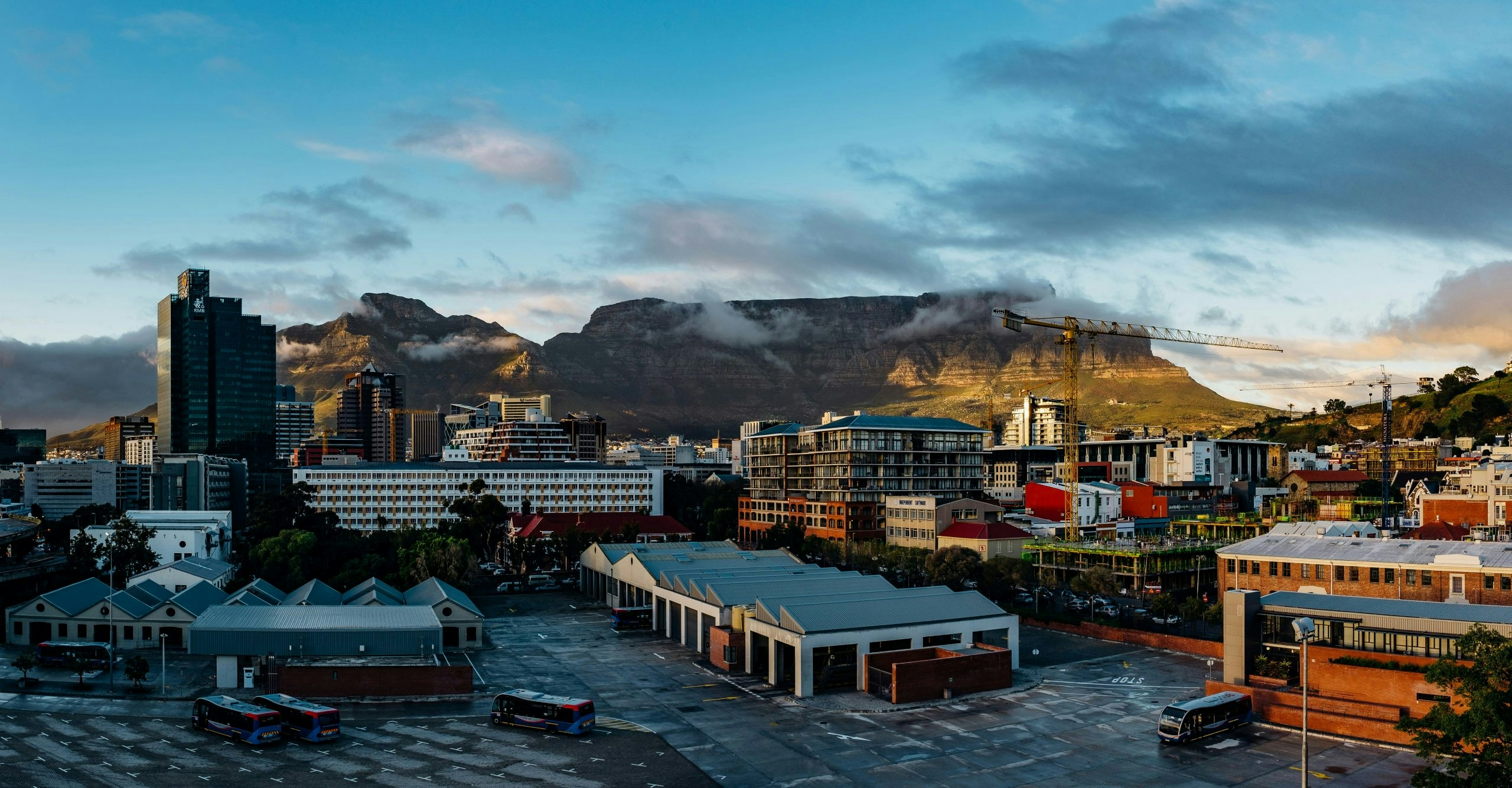 Modern cityscape of Cape Town under a bright blue sky