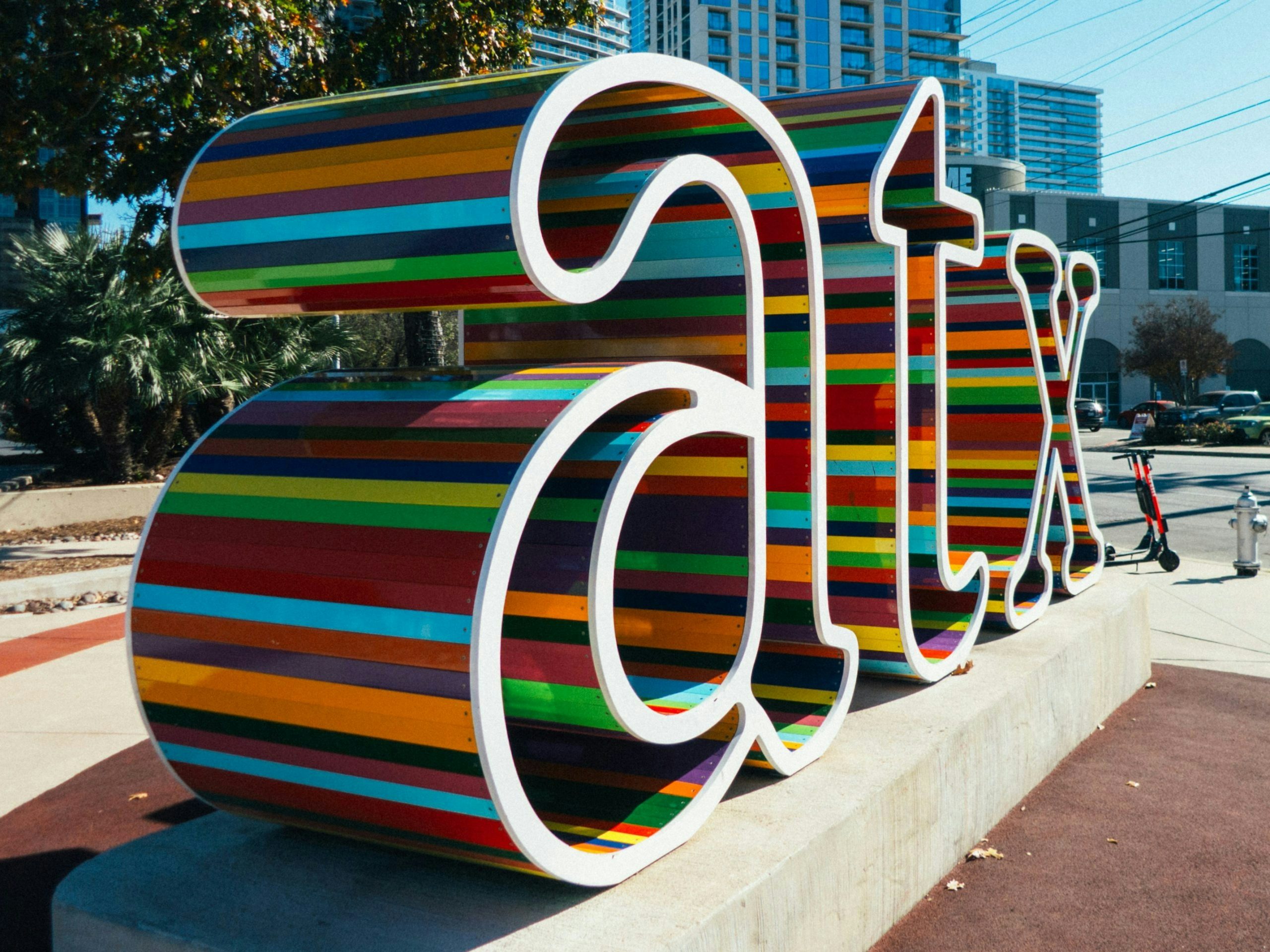 Large ATX sign displayed in a public space in Austin, Texas