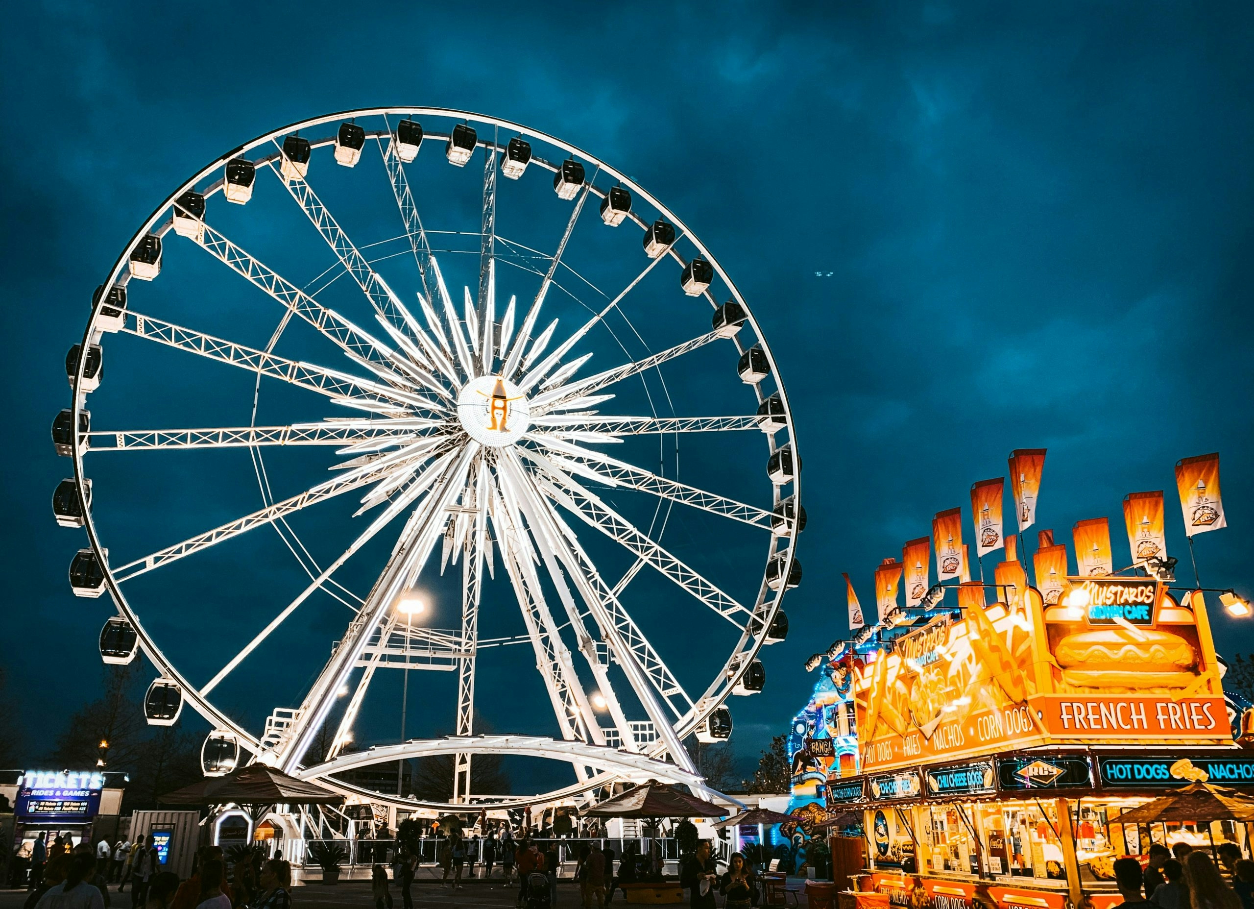 Iconic Ferris wheel glowing with colorful lights in Houston