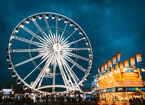 Iconic Ferris wheel glowing with colorful lights in Houston