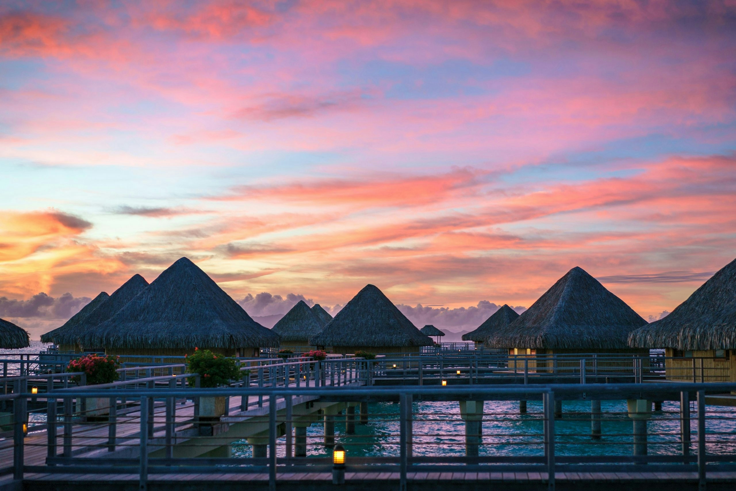 Golden sunset over the overwater bungalows in Bora Bora