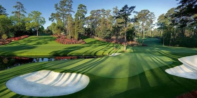 Well-maintained golf course surrounded by flowering trees in Augusta