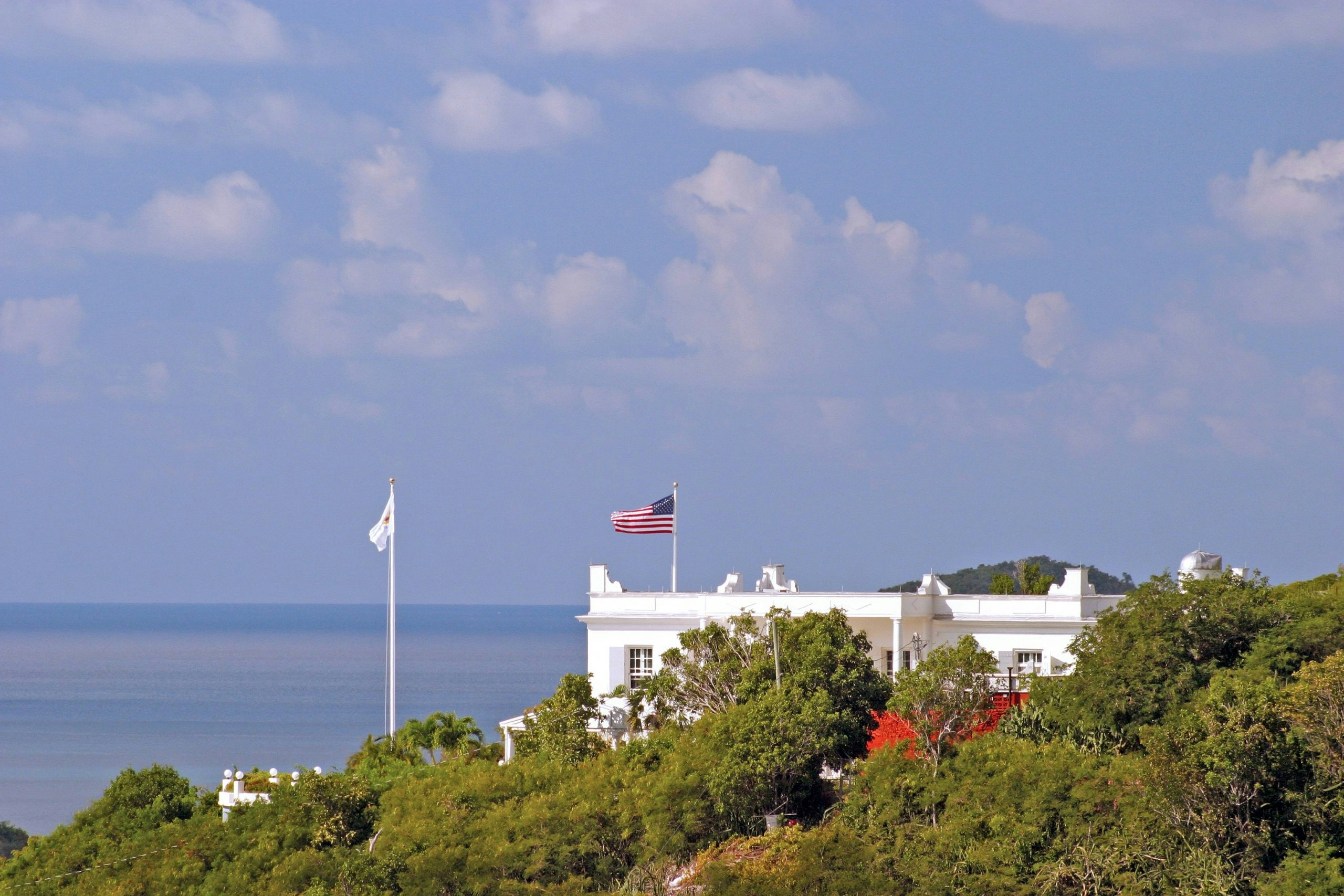 U.S. flag fluttering in the wind on a sunny day