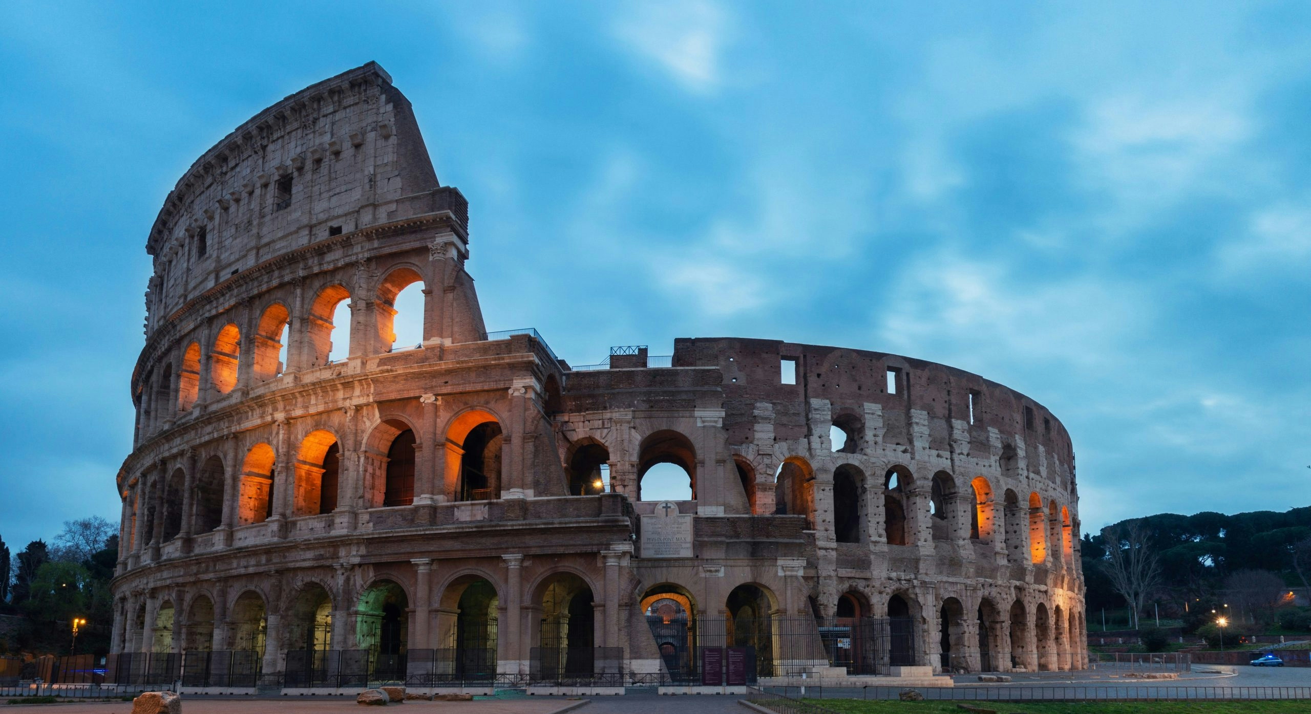 Ancient Roman Colosseum under a clear blue sky