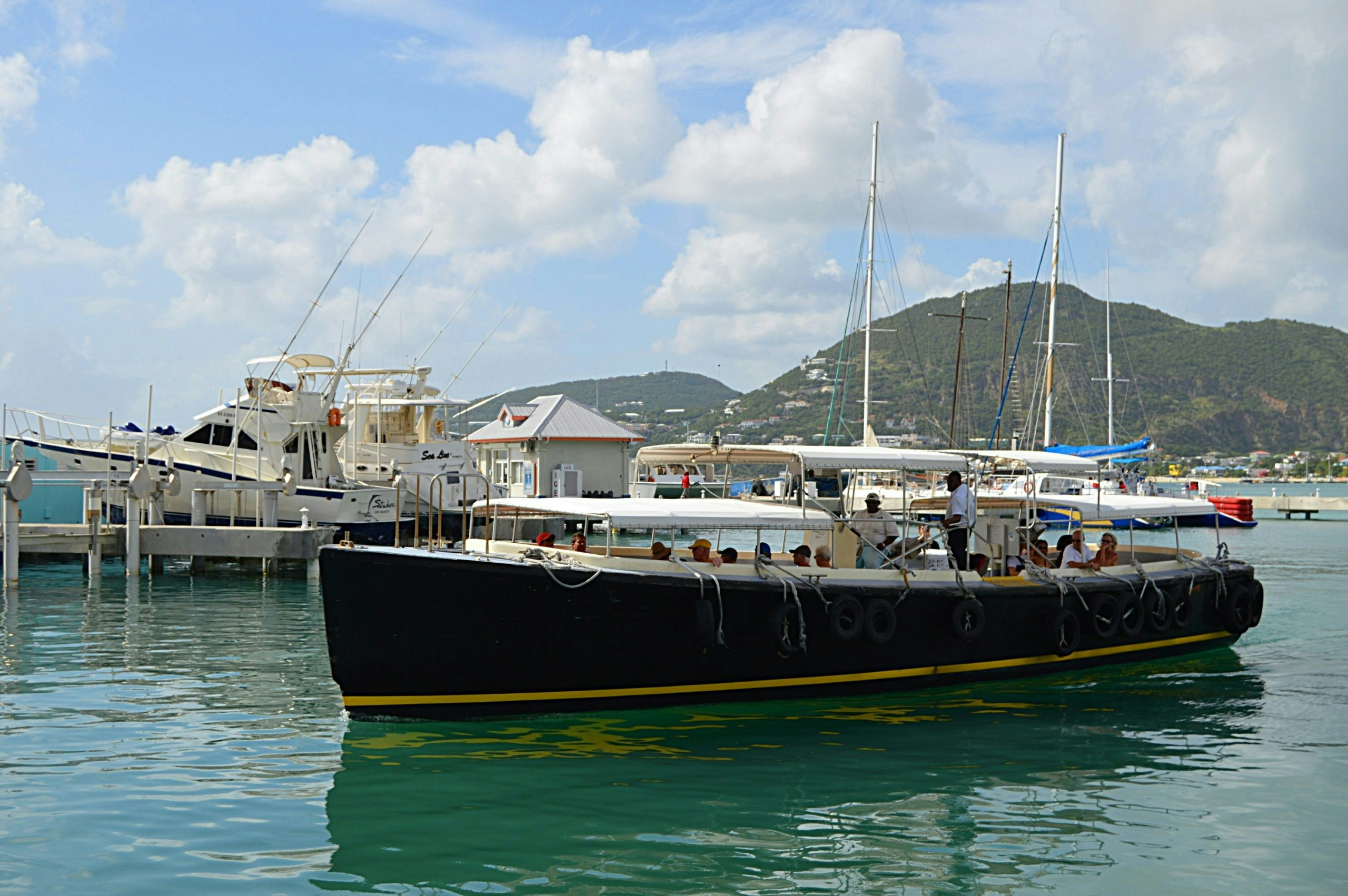 Boats cruising in the clear waters of St. Maarten
