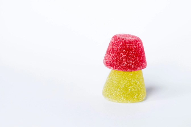 Two of the best mushroom gummies for microdosing stacked on top of each other.