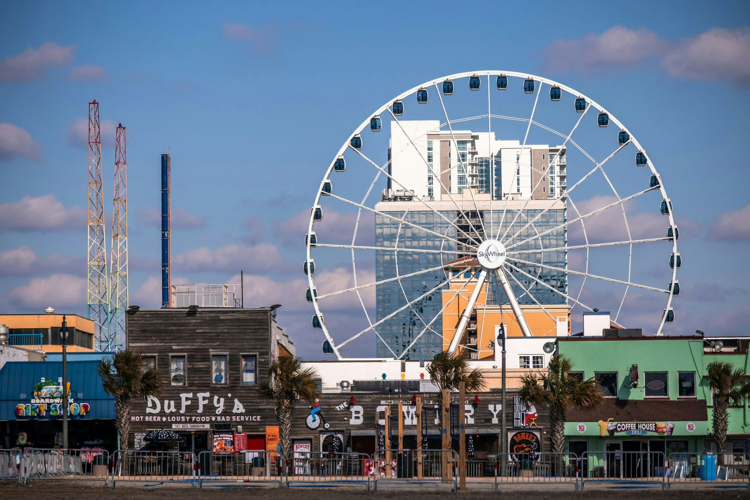 Scenic view of Myrtle Beach featuring sandy shores, blue ocean waters, and a vibrant coastal atmosphere