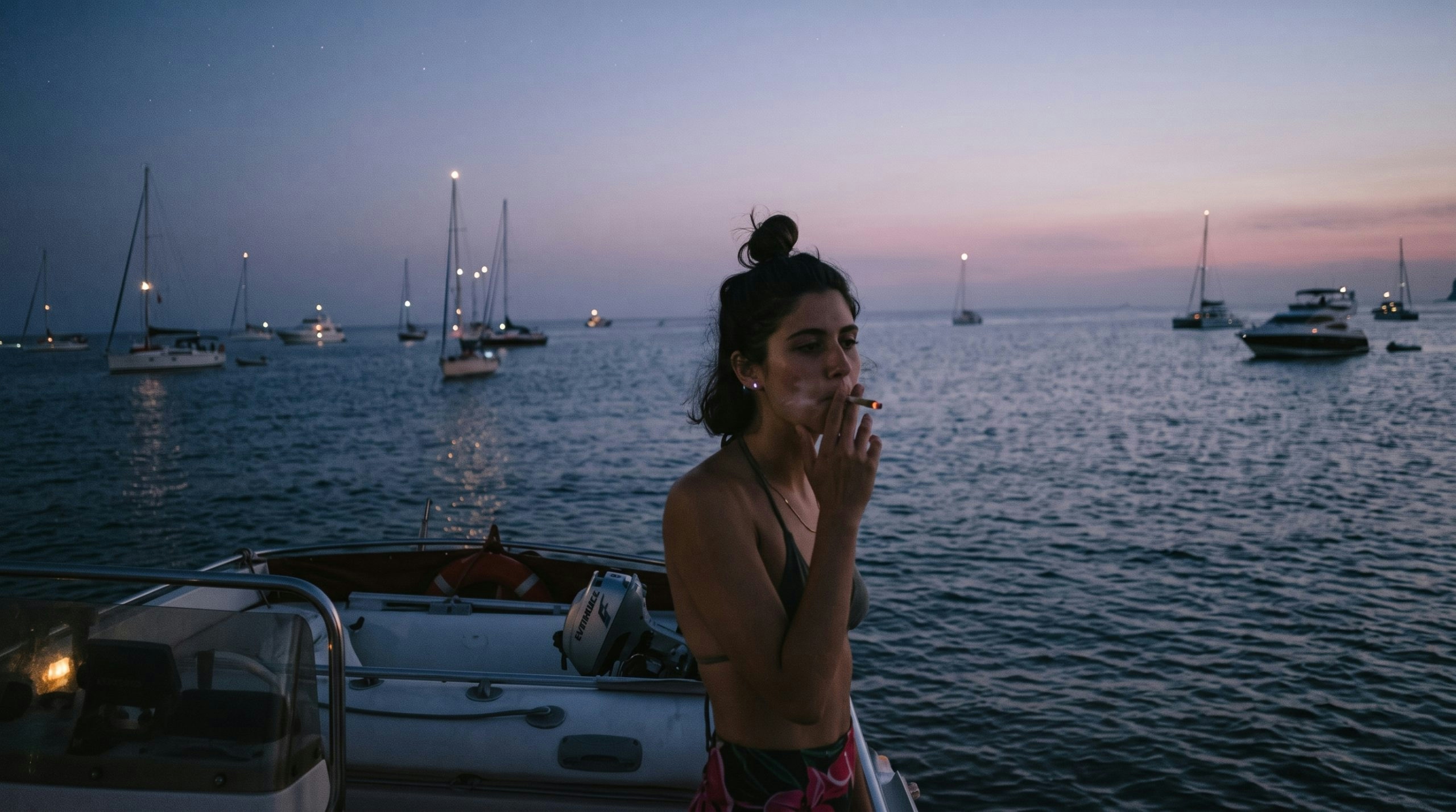 woman smoking by the beach