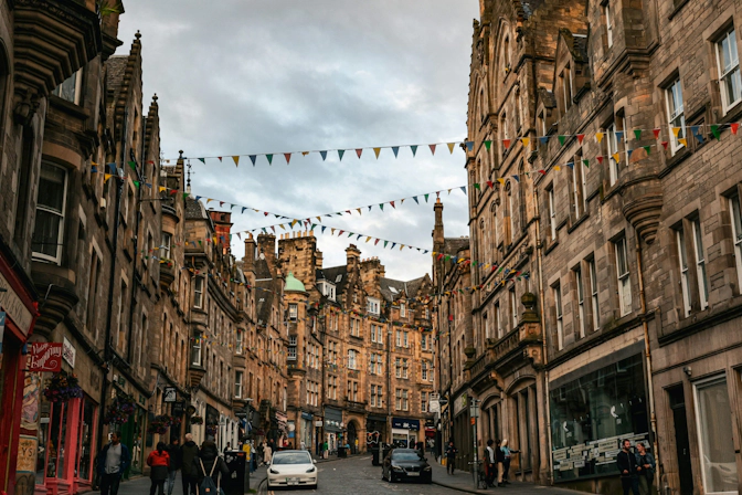 Traditional Edinburgh street decorated with colorful bunting