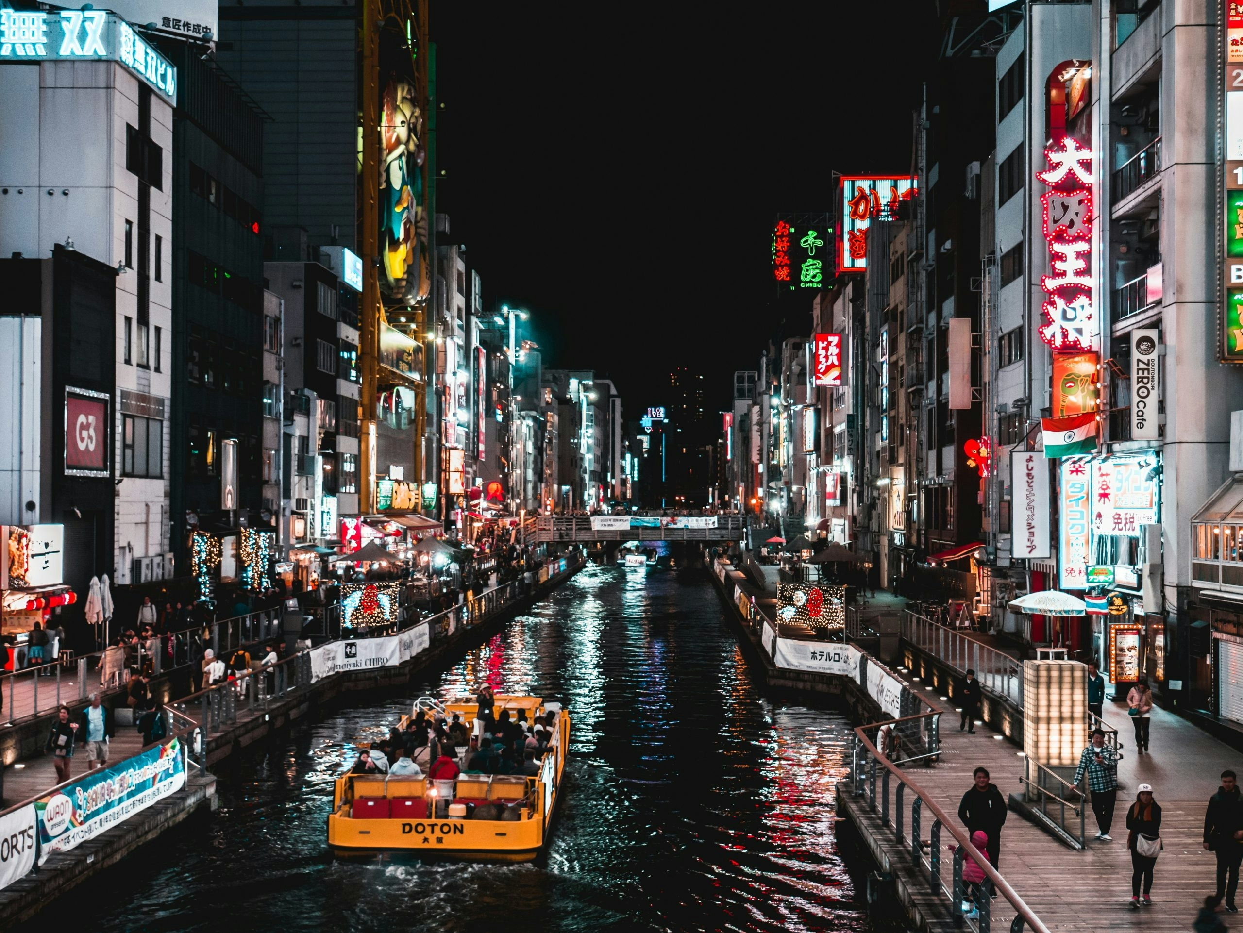 Nighttime view of Osaka illuminated by city lights