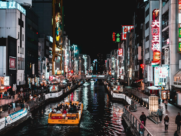 Nighttime view of Osaka illuminated by city lights