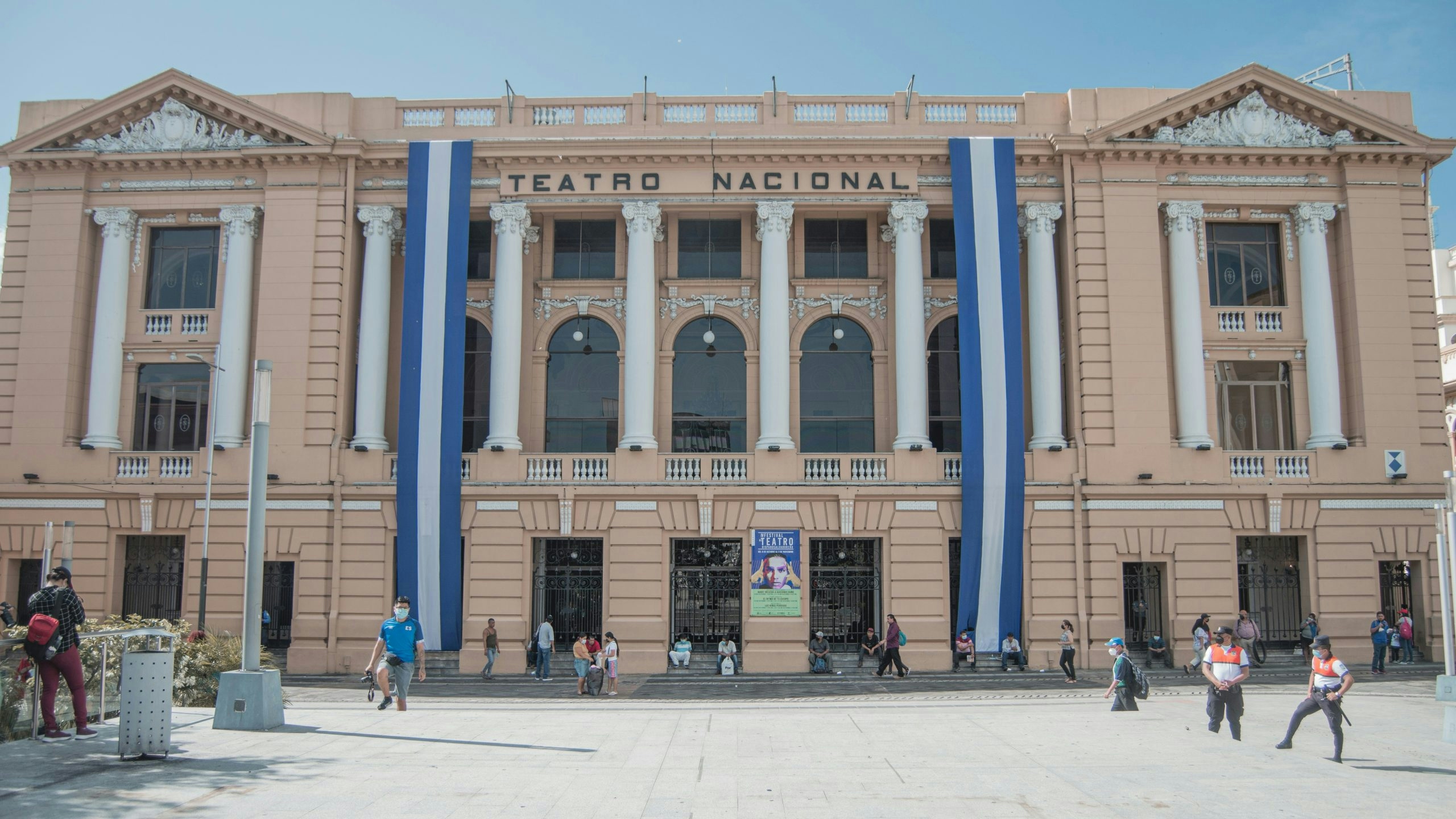 Traditional architecture in El Salvador decorated with national flags