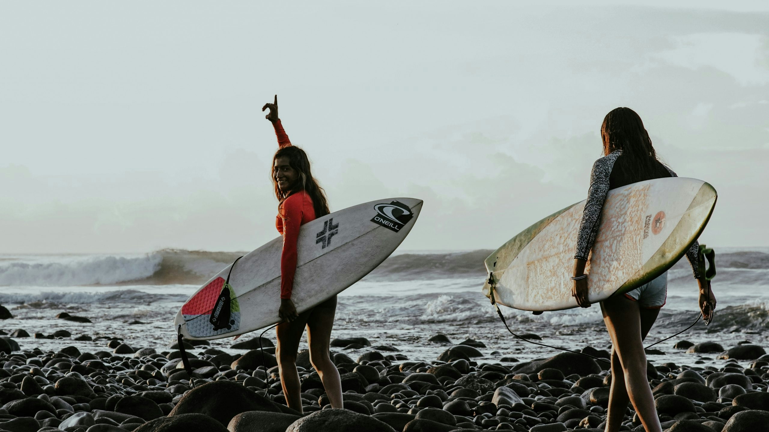 Surfers enjoying a sunny day on the coast of El Salvador
