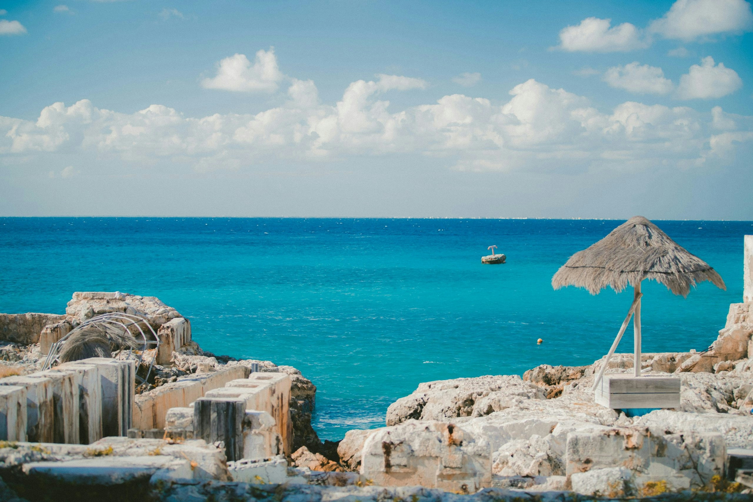 Tropical beach in Cozumel, Mexico, with clear turquoise waters and sandy shores