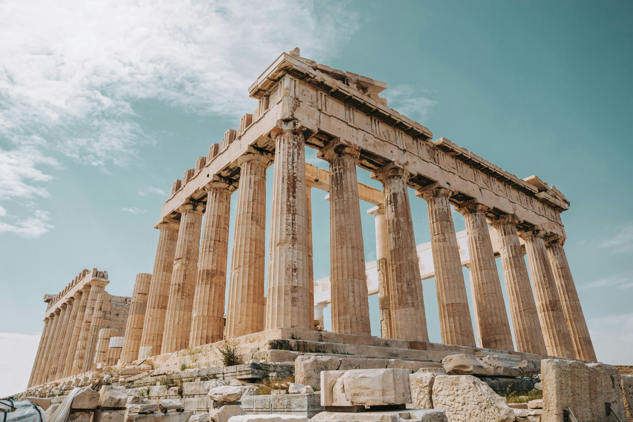 Historic monument standing along a traditional street in Athens