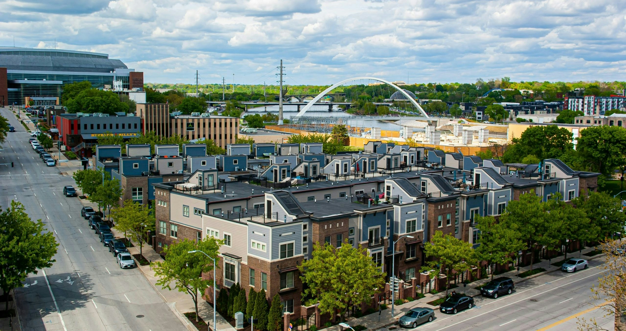 Aerial view of Des Moines with urban streets and green spaces